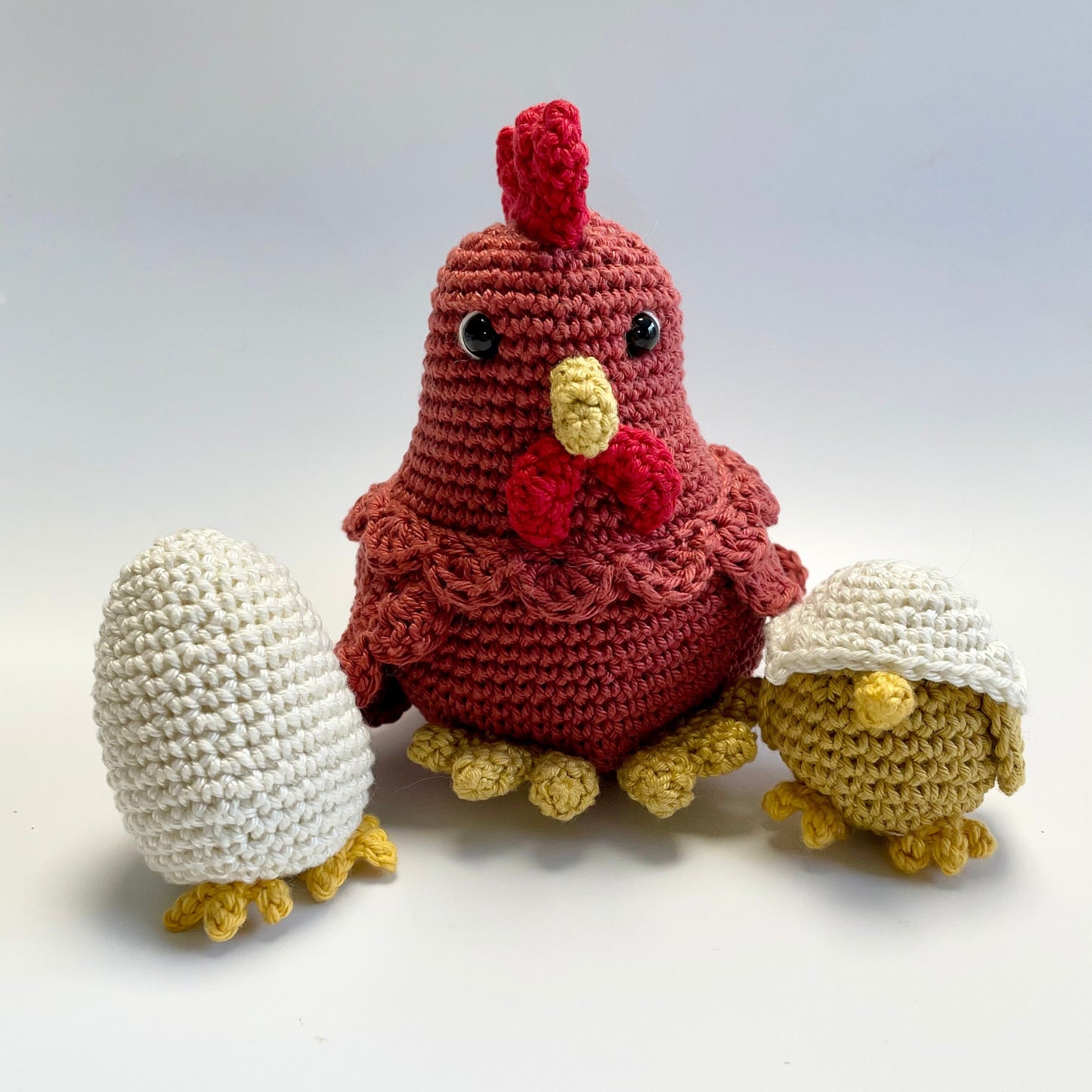 Mother Hen, Egg & Chick Crochet Kit. Including luxury British yarns, gorgeous accessories, plus a delightful story book and card.