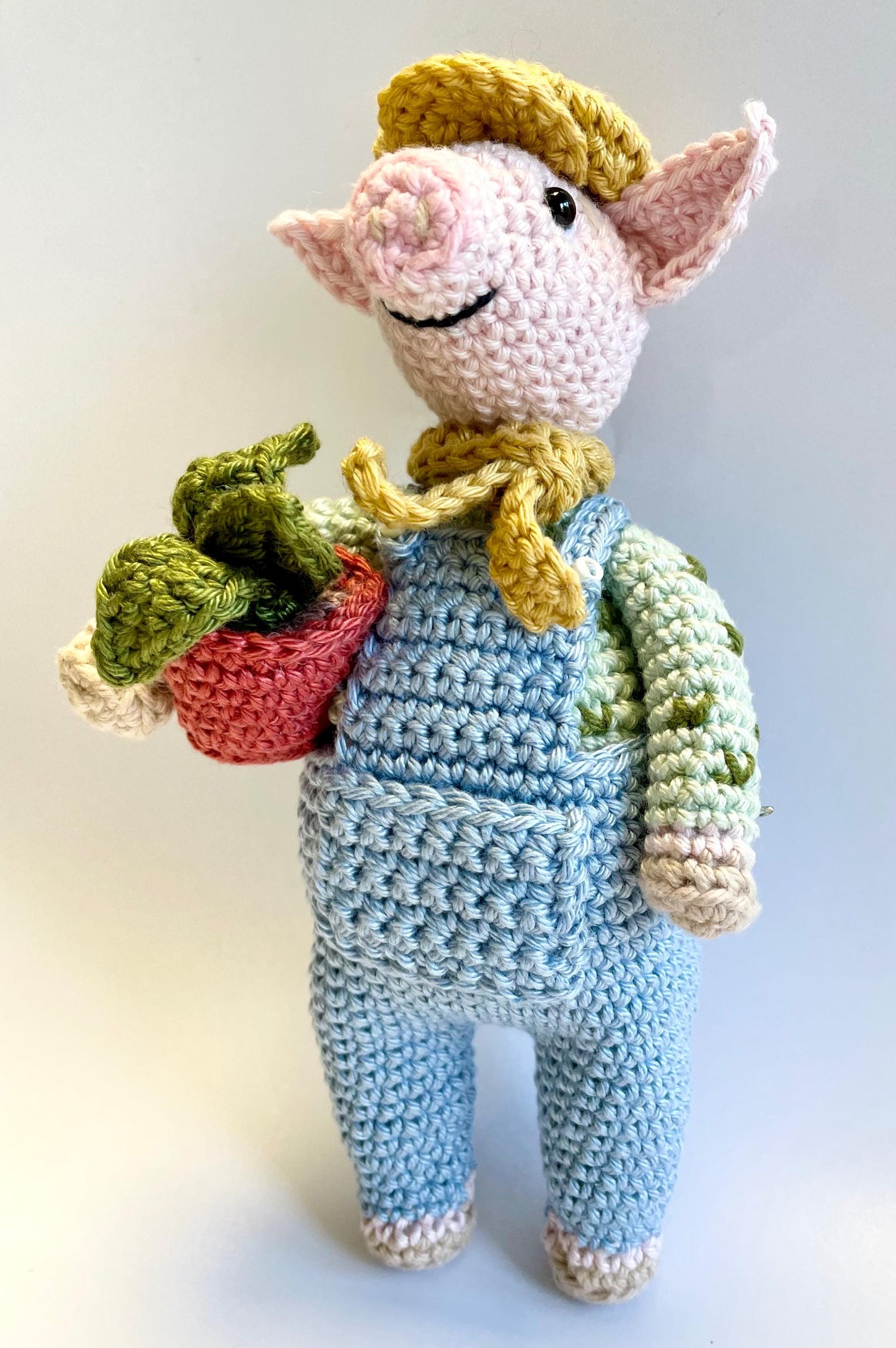Ebb The Gardener! Pig Amigurumi Crochet Kit featuring Ebb, A laid-back, dungaree clad pig with a passion for Plants!