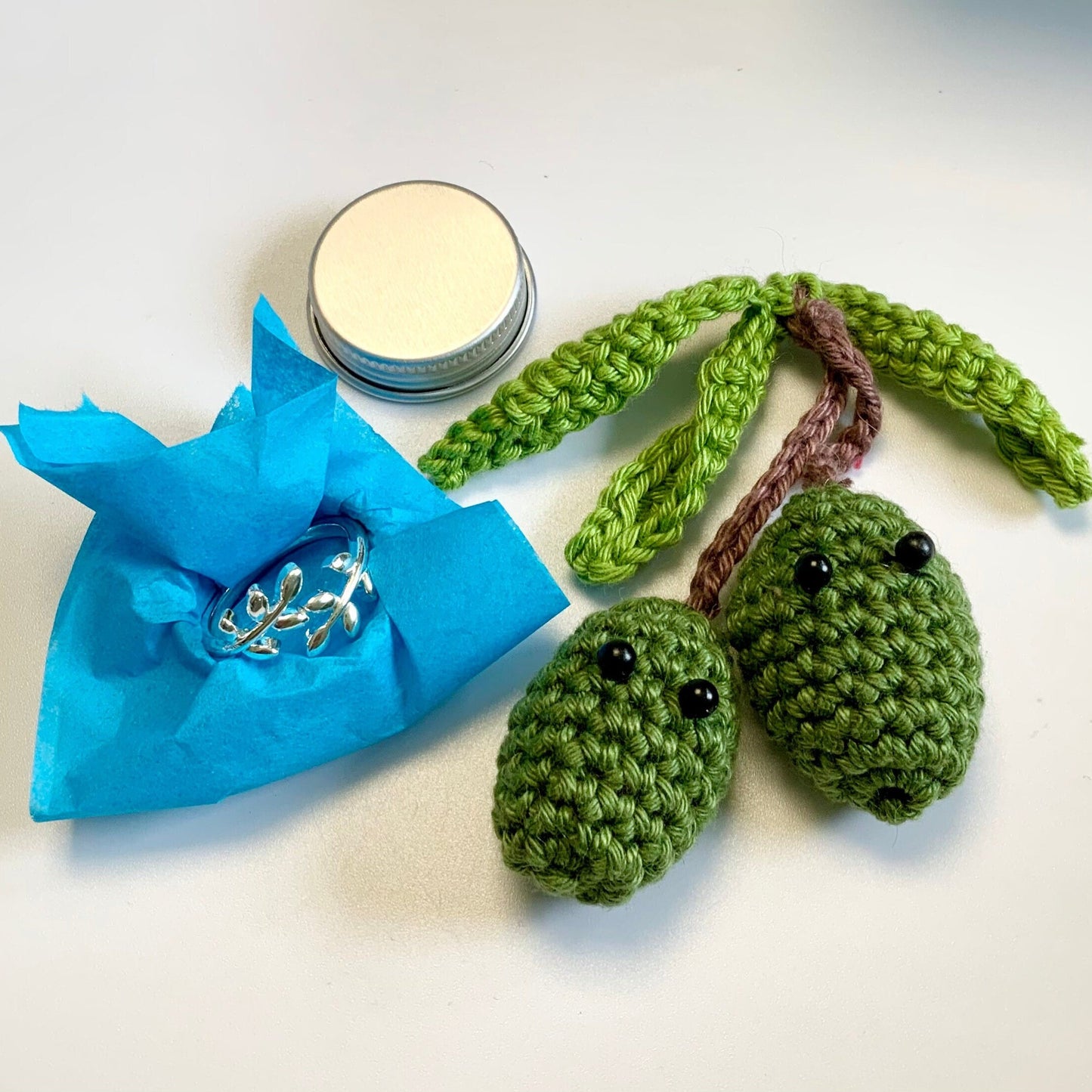 Olive Leaves Crochet Ring. Olive leaves feature in this silver plated, adjustable ring for crochet tension and comfort.