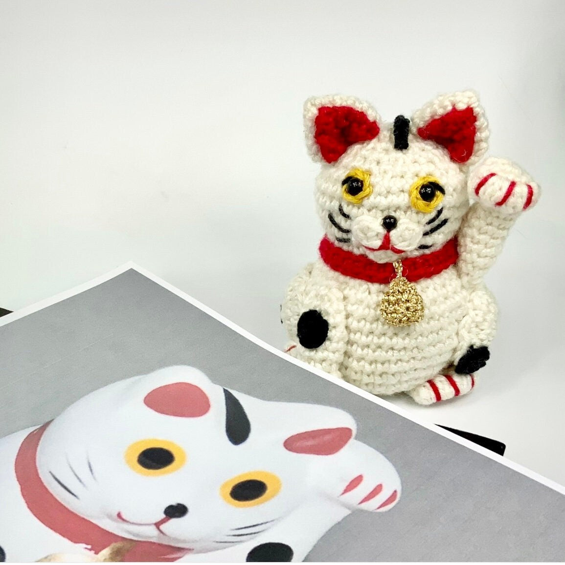 Maneki Neko the Japanese Beckoning Cat Amigurumi Crochet Kit. A complete kit with luxury, natural yarns.