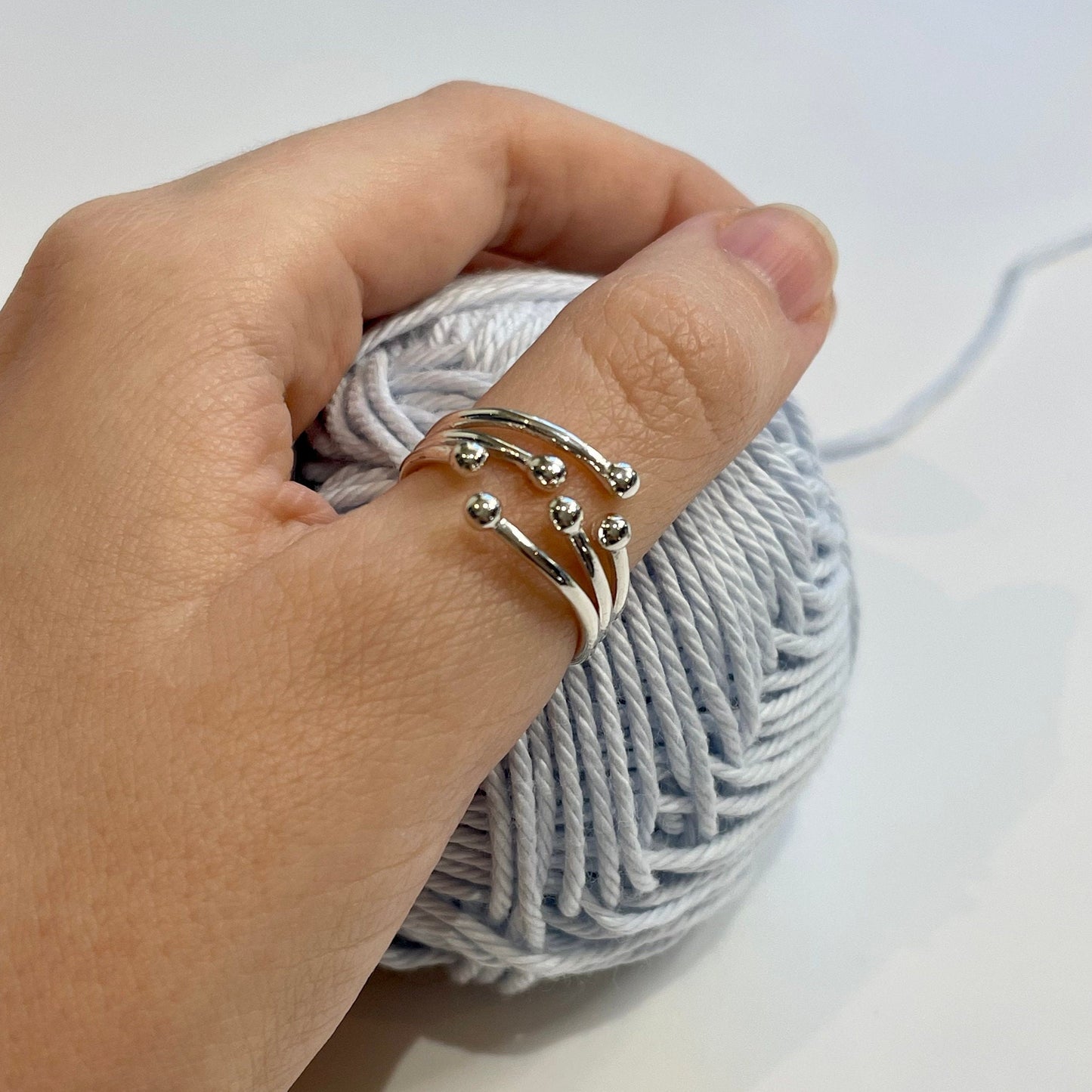 Celestial Orbs Handmade Sterling Silver Crochet Ring. Adjustable for crochet tension and comfort. Handmade Silver for Nautilus Crochet.