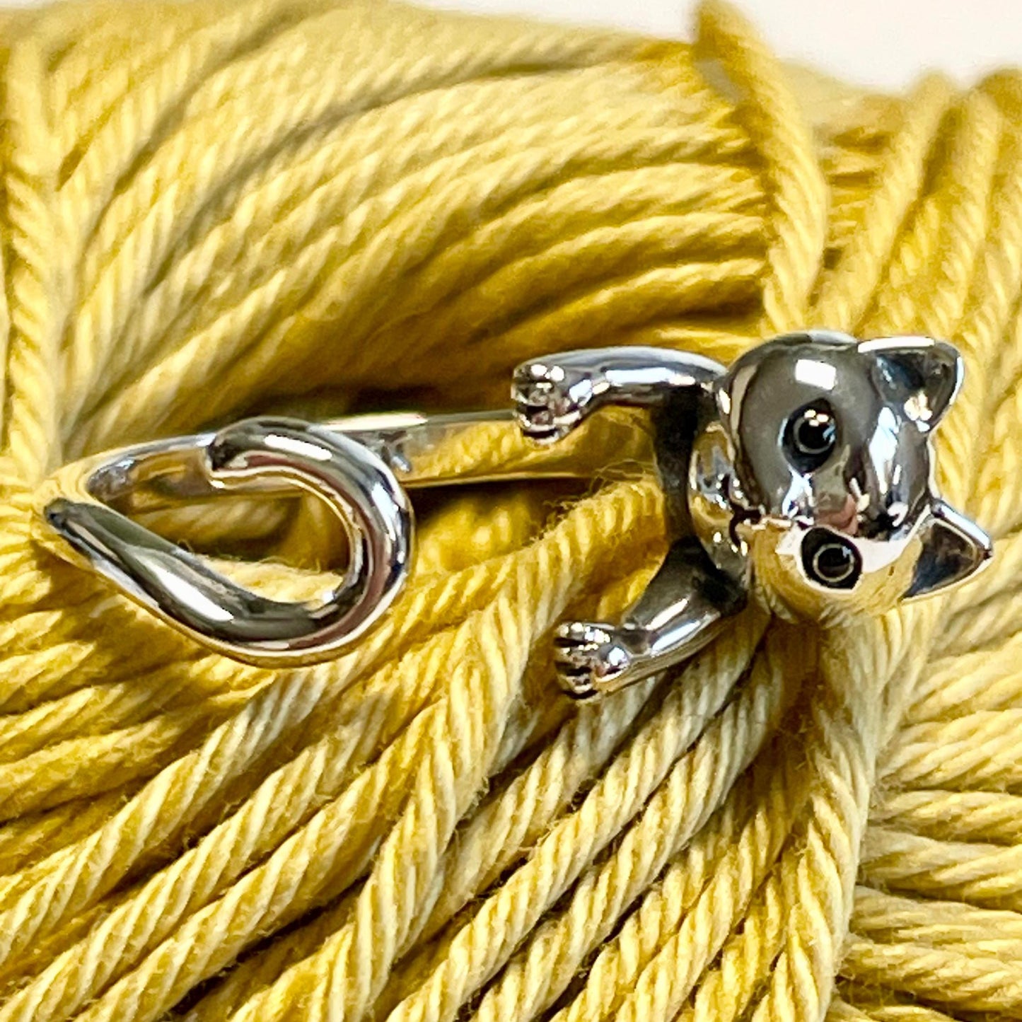 Playful Cat 925 Sterling Silver Crochet Ring. Gorgeous bright eyed cat with a curly tail. Adjustable size for crochet tension and comfort.