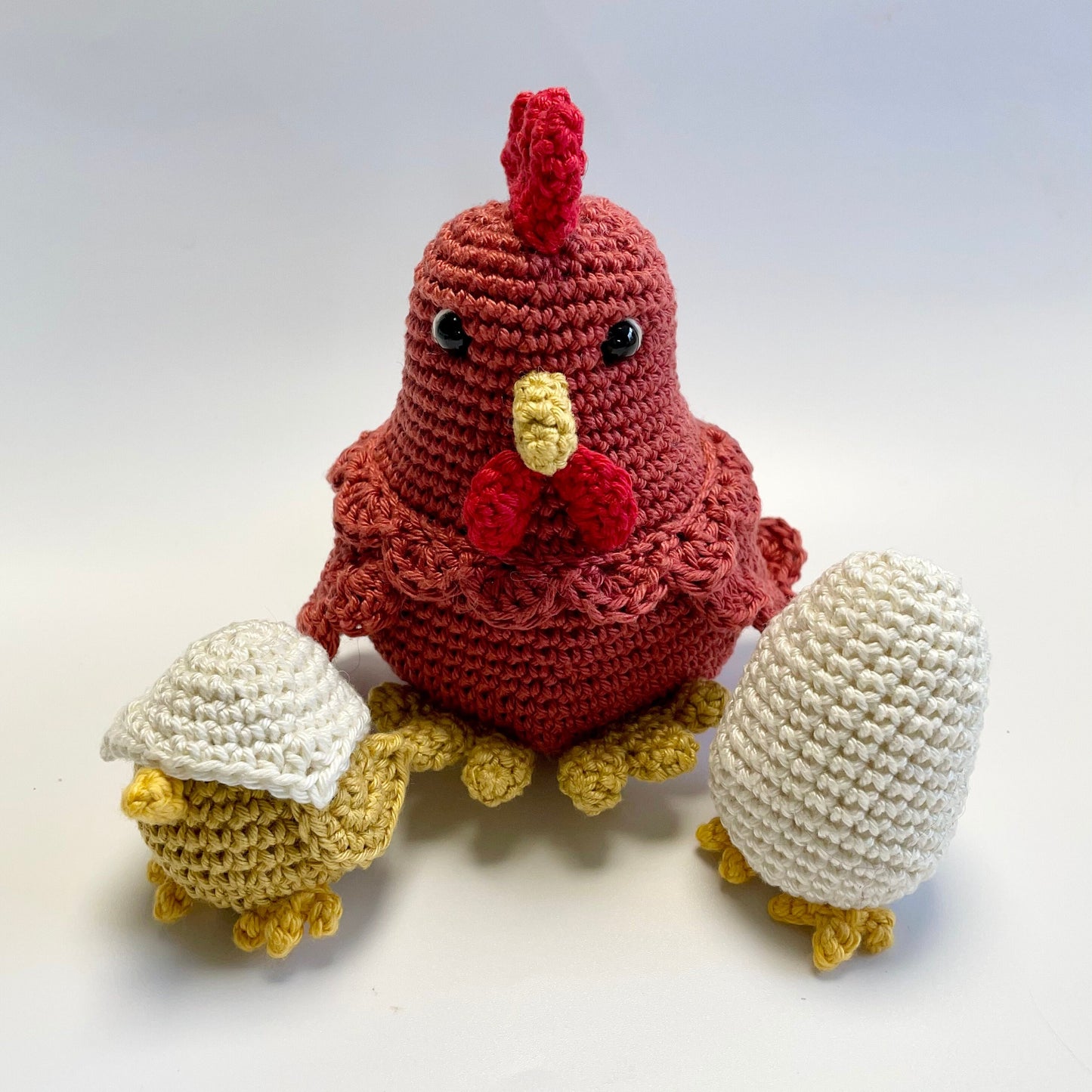 Mother Hen, Egg & Chick Crochet Kit. Including luxury British yarns, gorgeous accessories, plus a delightful story book and card.