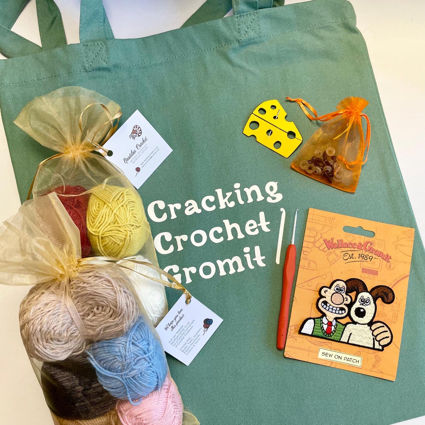 Wallace & Gromit Cracking Crochet Kit. Book, Luxury Cotton Yarns, Hook and accessories in an Organic Cotton 'Cracking Crochet Gromit' Bag.