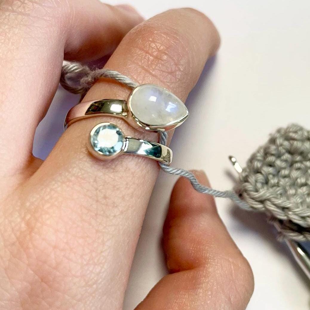 Handmade Blue Topaz and Moonstone Sterling Silver Crochet Ring. Adjustable for crochet tension and comfort. Handmade for Nautilus Crochet.
