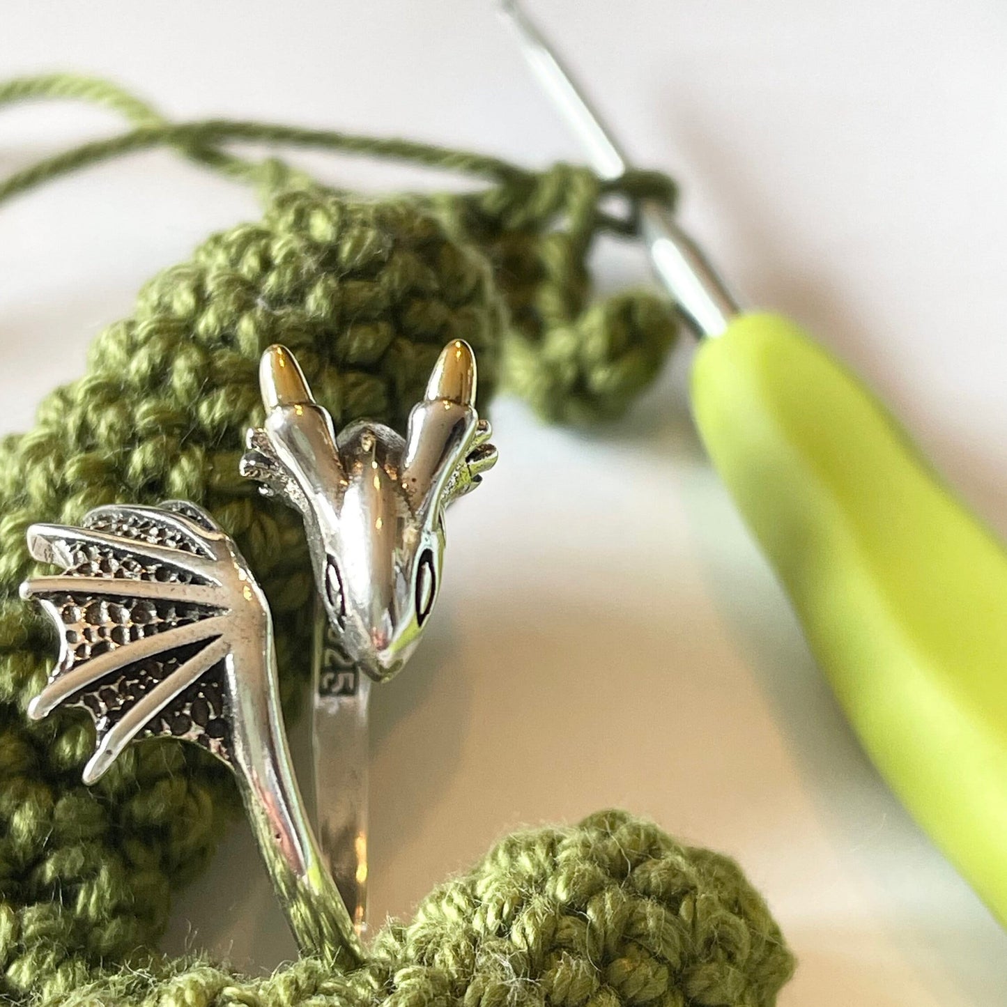 Dragon Crochet Ring in Sterling Silver. The cutest little dragon features in this silver, adjustable ring for crochet tension and comfort.