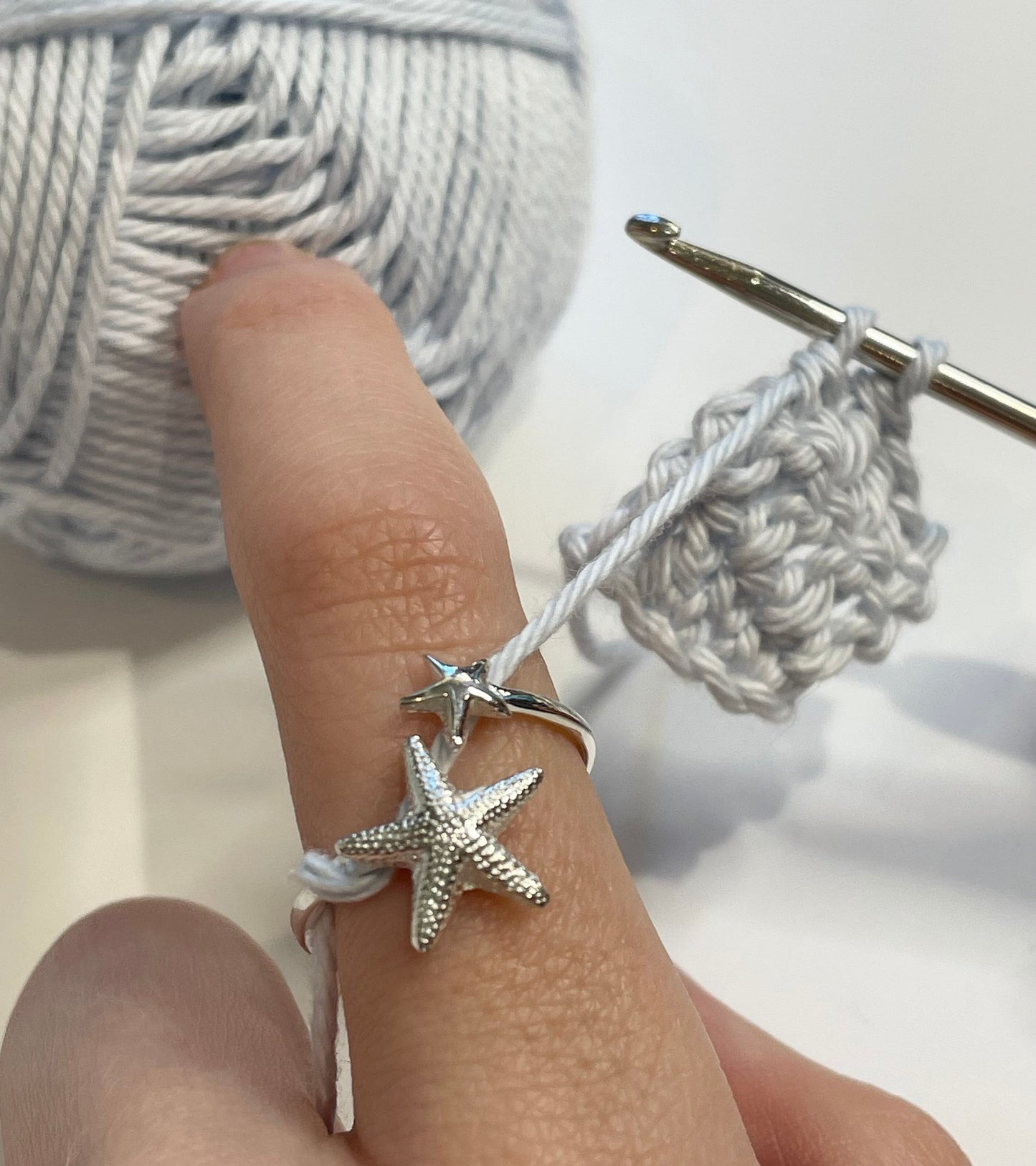 Handmade 'Starfish' Sterling Silver Crochet Ring. Adjustable for crochet tension and comfort. Handmade in Silver for Nautilus Crochet.