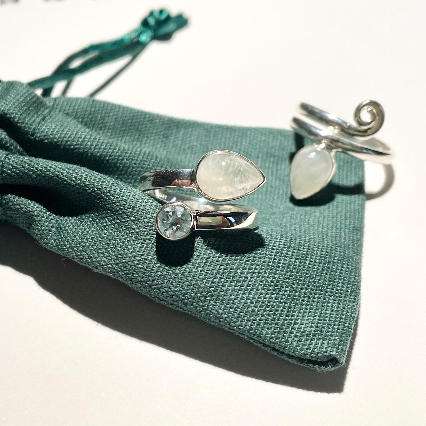 Handmade Blue Topaz and Moonstone Sterling Silver Crochet Ring. Adjustable for crochet tension and comfort. Handmade for Nautilus Crochet.