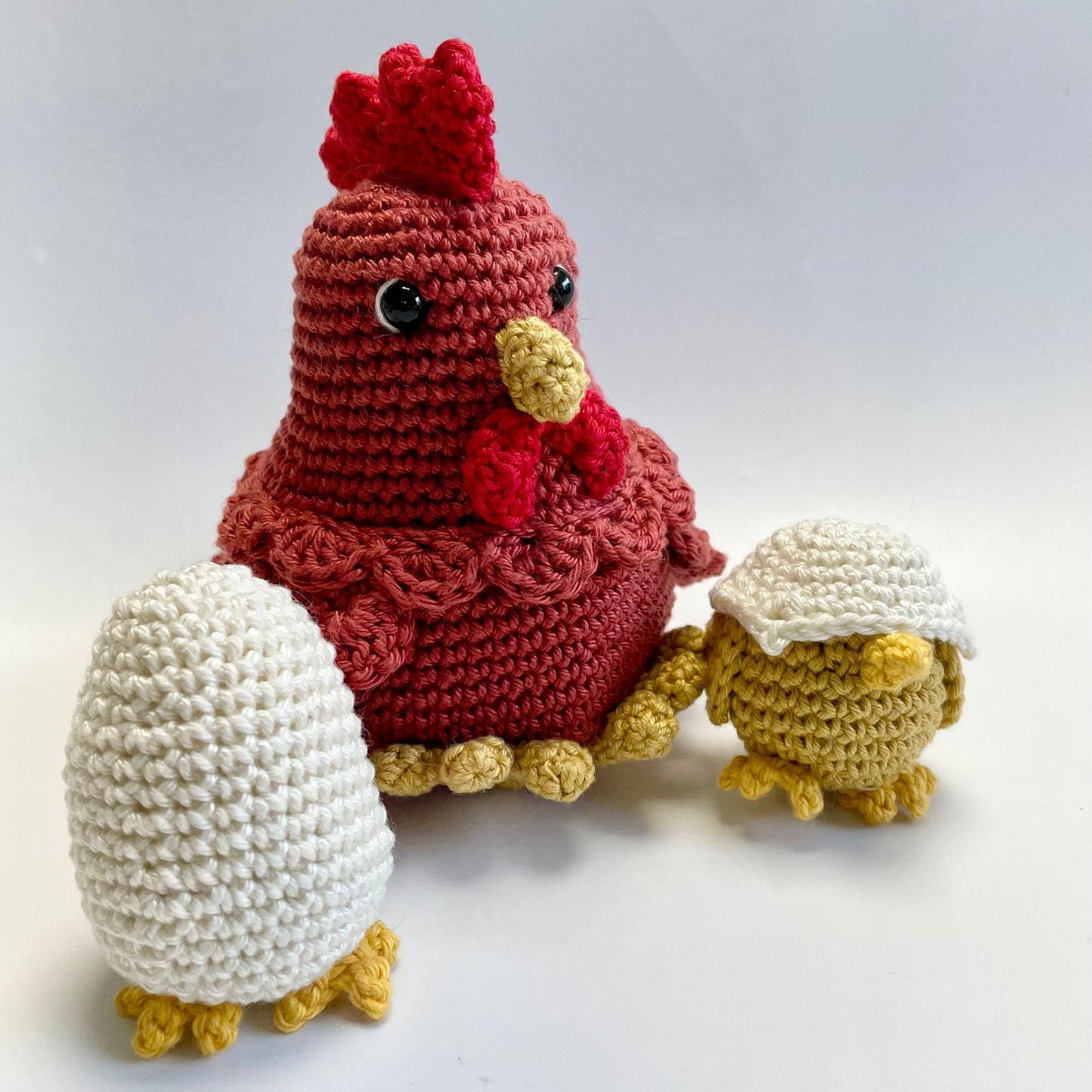 Mother Hen, Egg & Chick Crochet Kit. Including luxury British yarns, gorgeous accessories, plus a delightful story book and card.