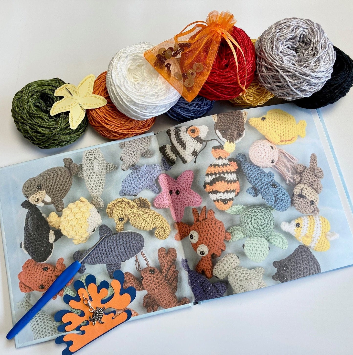Crocheted Ocean Kit. Book, luxury yarn, crochet hook, turtle stitch marker & accessories. Make the cutest sea creature buddies!