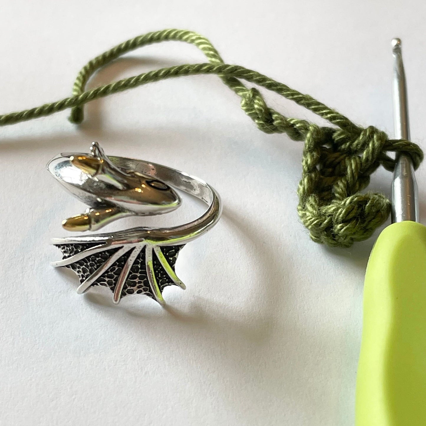 Dragon Crochet Ring in Sterling Silver. The cutest little dragon features in this silver, adjustable ring for crochet tension and comfort.