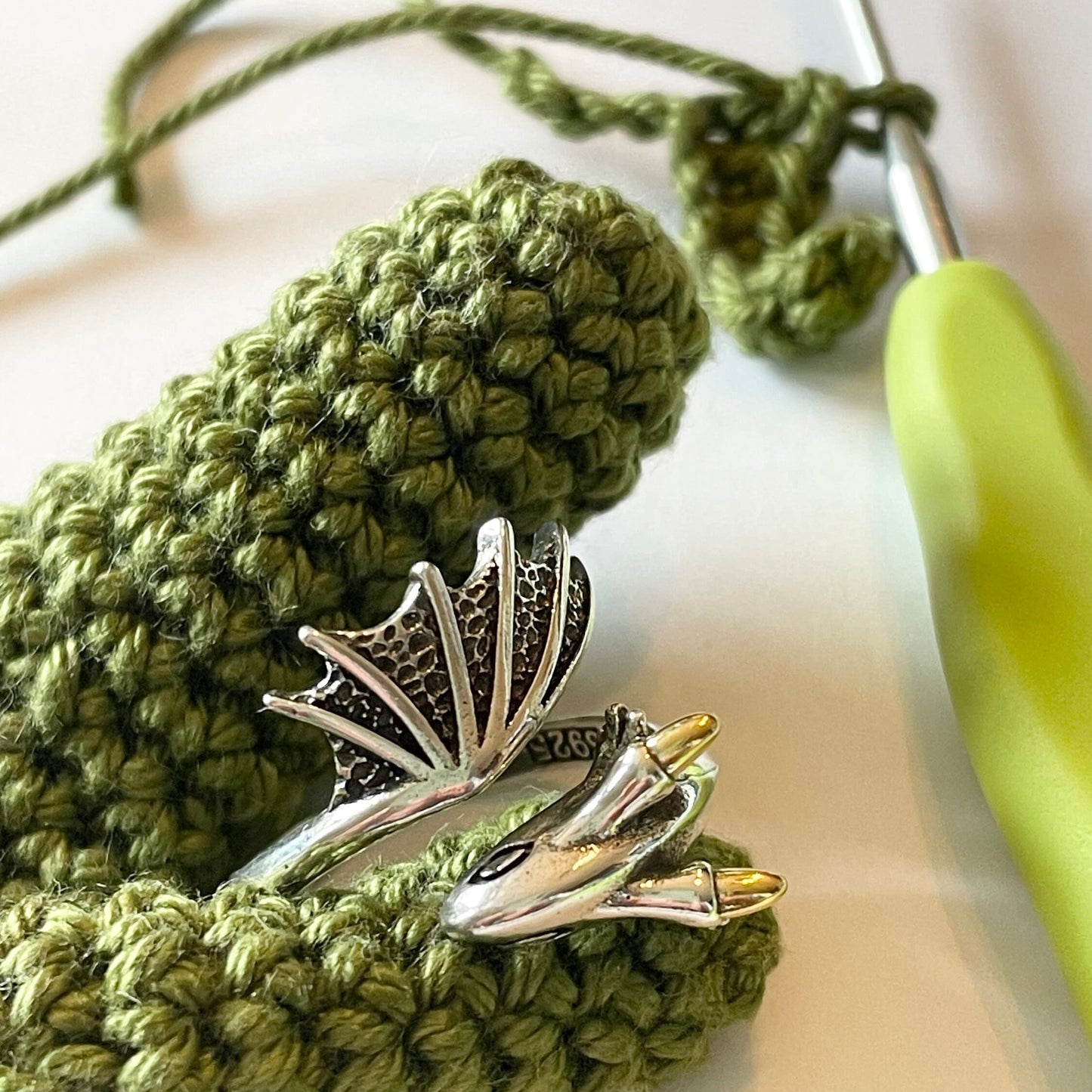 Dragon Crochet Ring in Sterling Silver. The cutest little dragon features in this silver, adjustable ring for crochet tension and comfort.