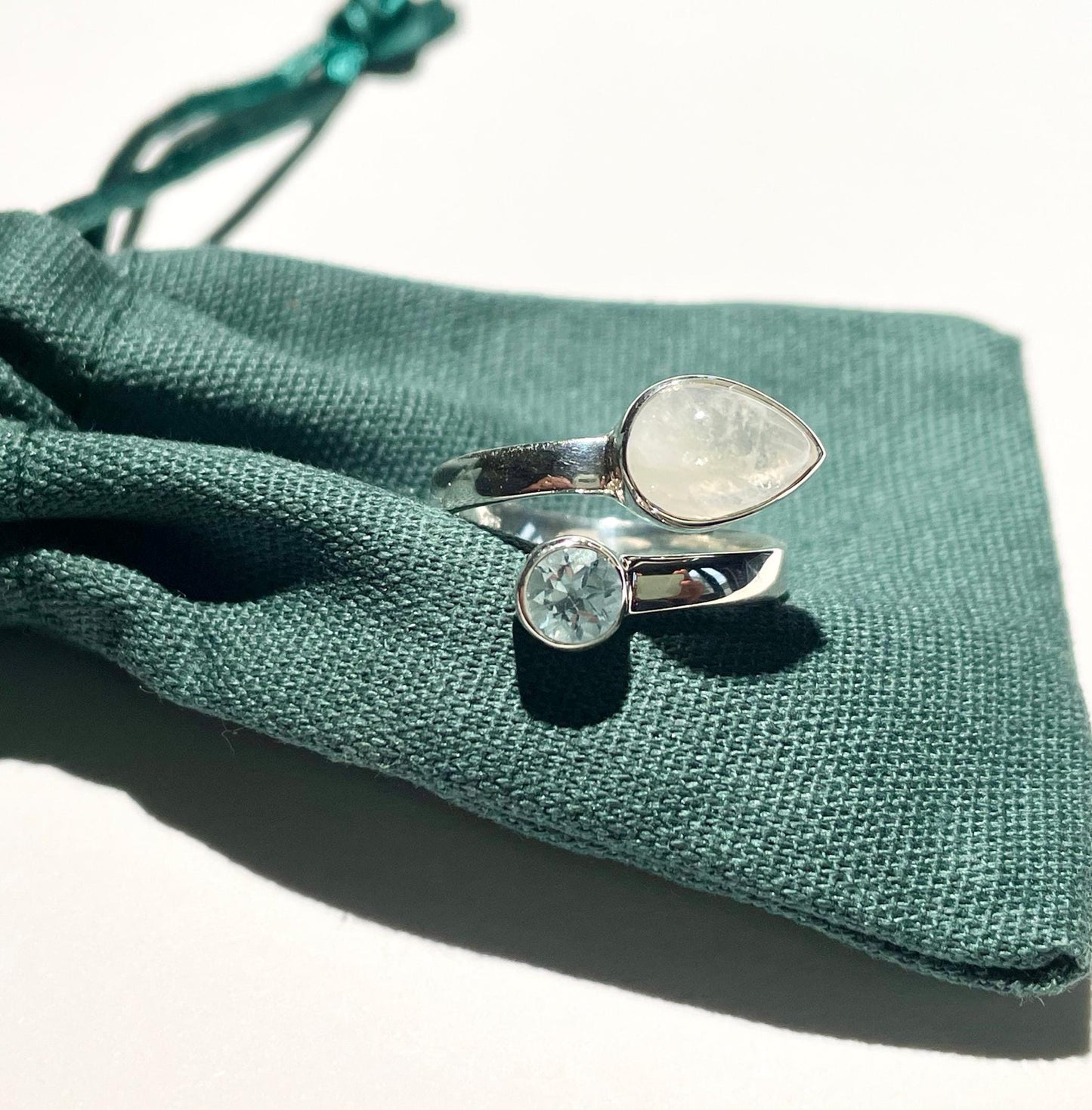Handmade Blue Topaz and Moonstone Sterling Silver Crochet Ring. Adjustable for crochet tension and comfort. Handmade for Nautilus Crochet.
