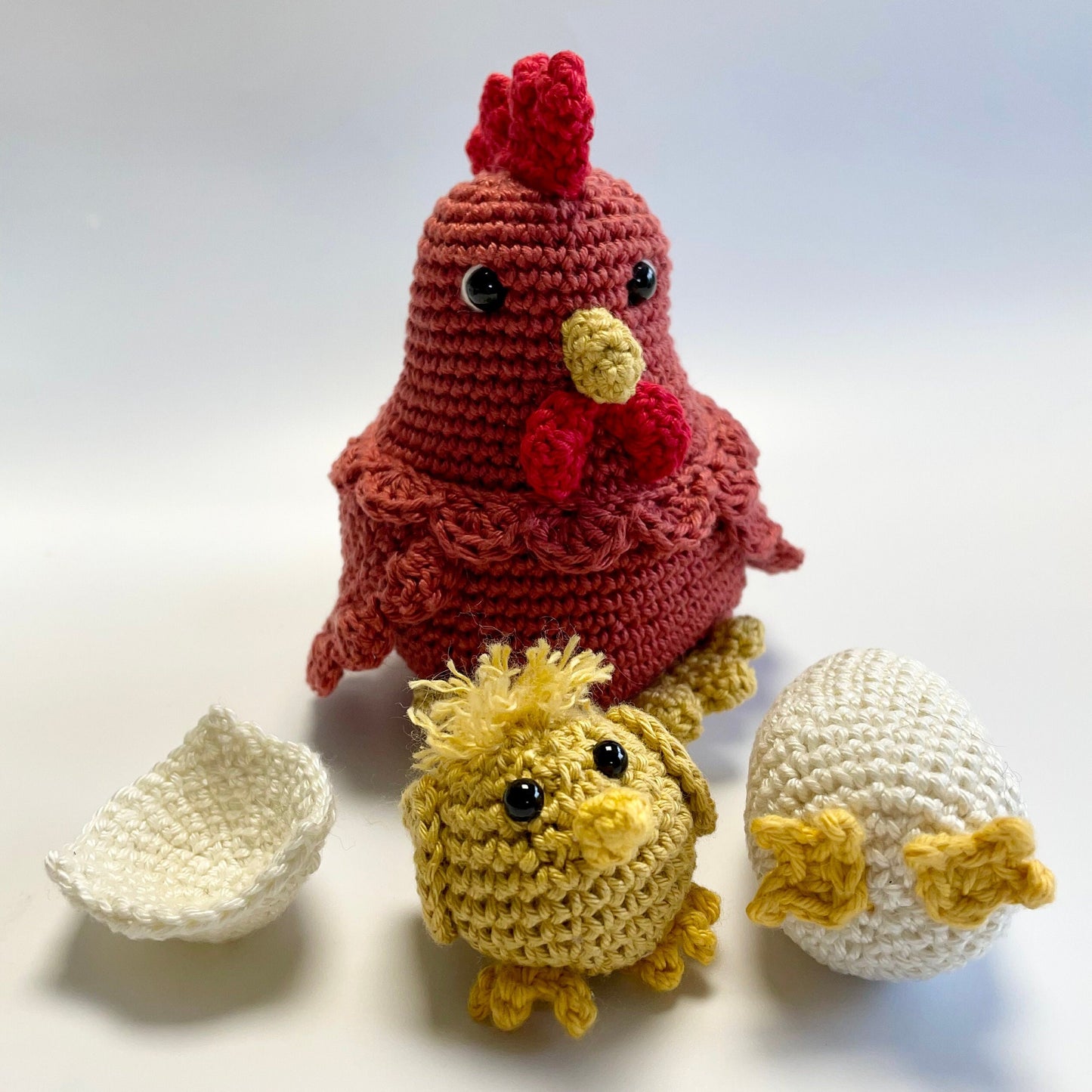 Mother Hen, Egg & Chick Crochet Kit. Including luxury British yarns, gorgeous accessories, plus a delightful story book and card.