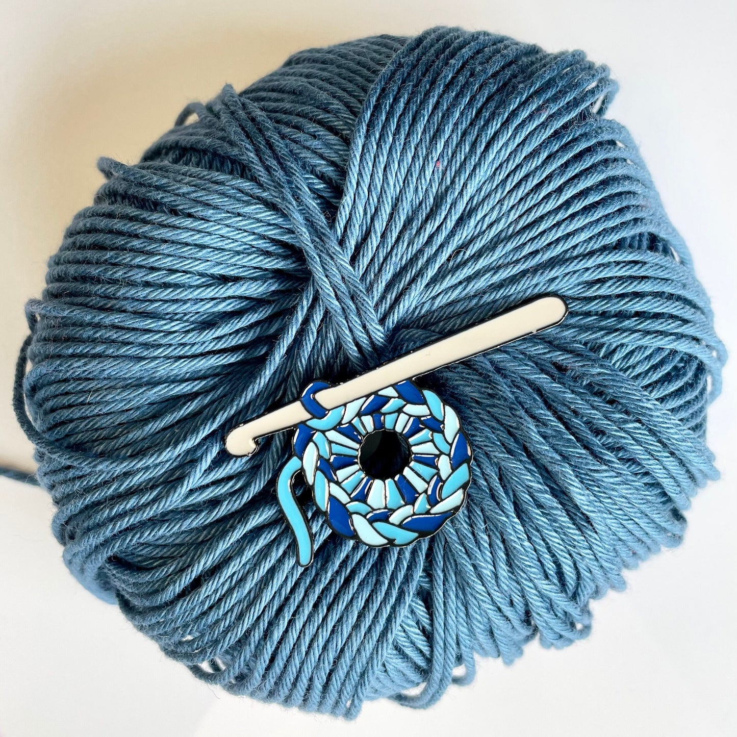 Crochet Pin Badge. Enamel pin badge featuring a cute crocheted magic ring!