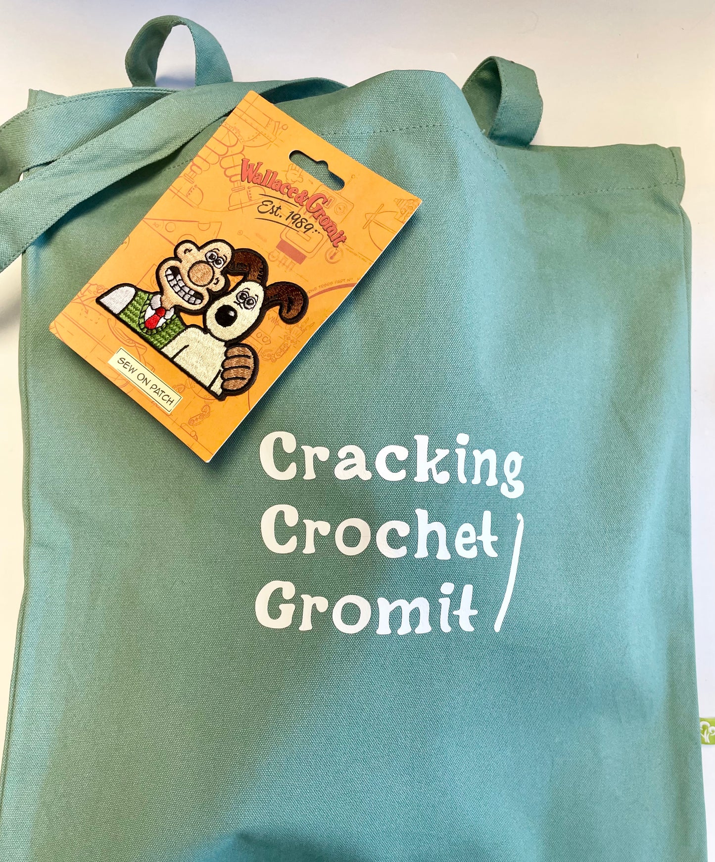 Wallace & Gromit Cracking Crochet Kit. Book, Luxury Cotton Yarns, Hook and accessories in an Organic Cotton 'Cracking Crochet Gromit' Bag.