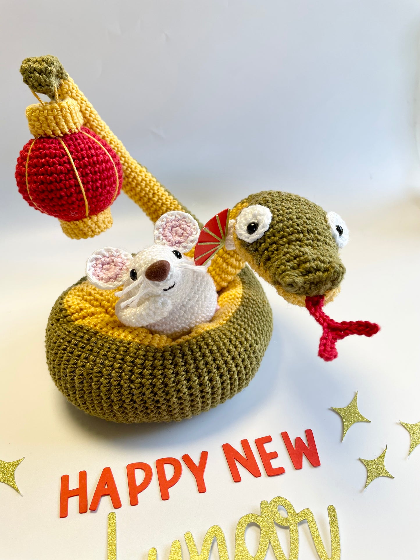 Lunar New Year Snake & Lantern Crochet Kit. Complete kit with full instructions, crochet hook and luxury yarns.