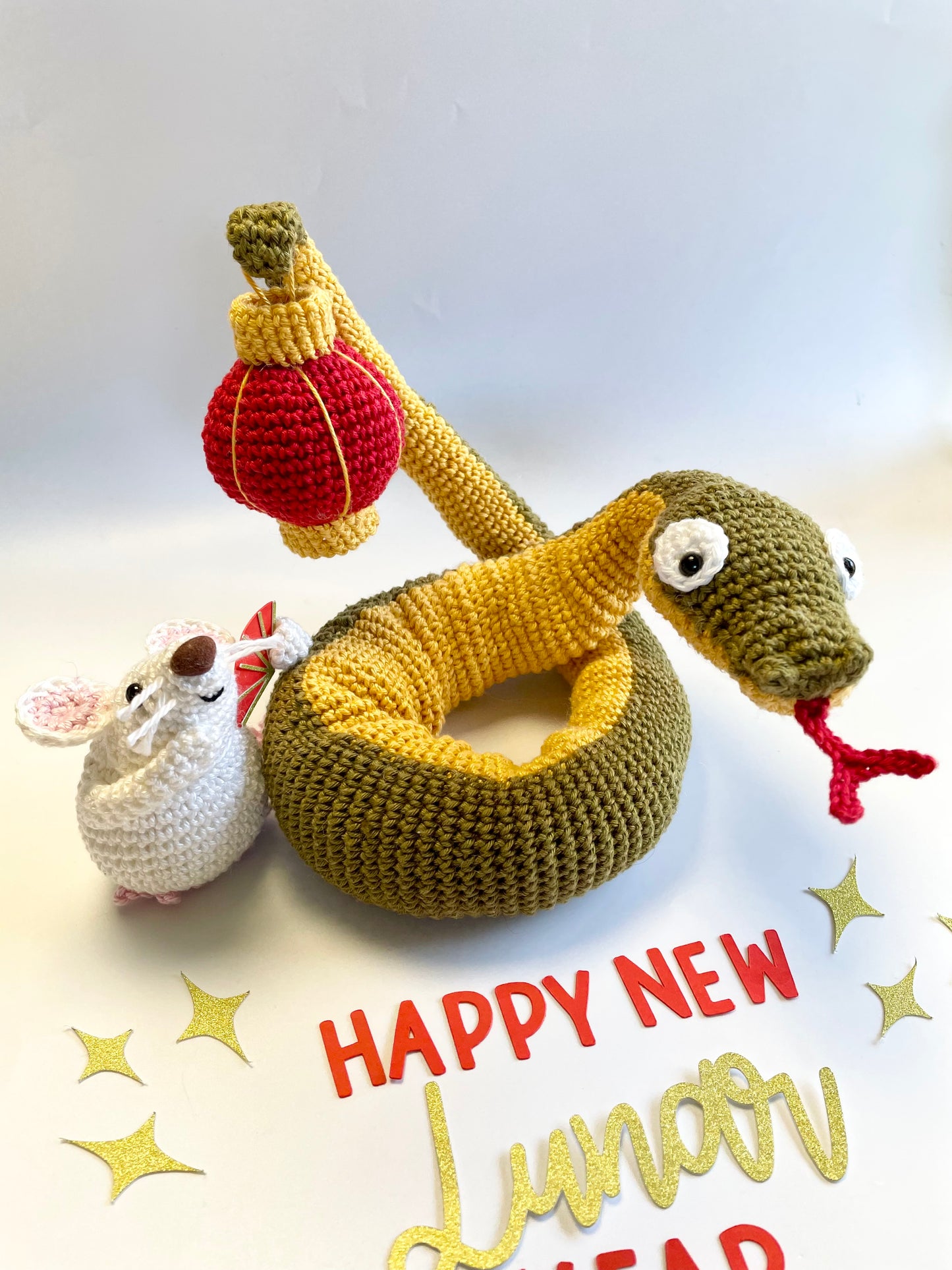 Lunar New Year Snake & Lantern Crochet Kit. Complete kit with full instructions, crochet hook and luxury yarns.