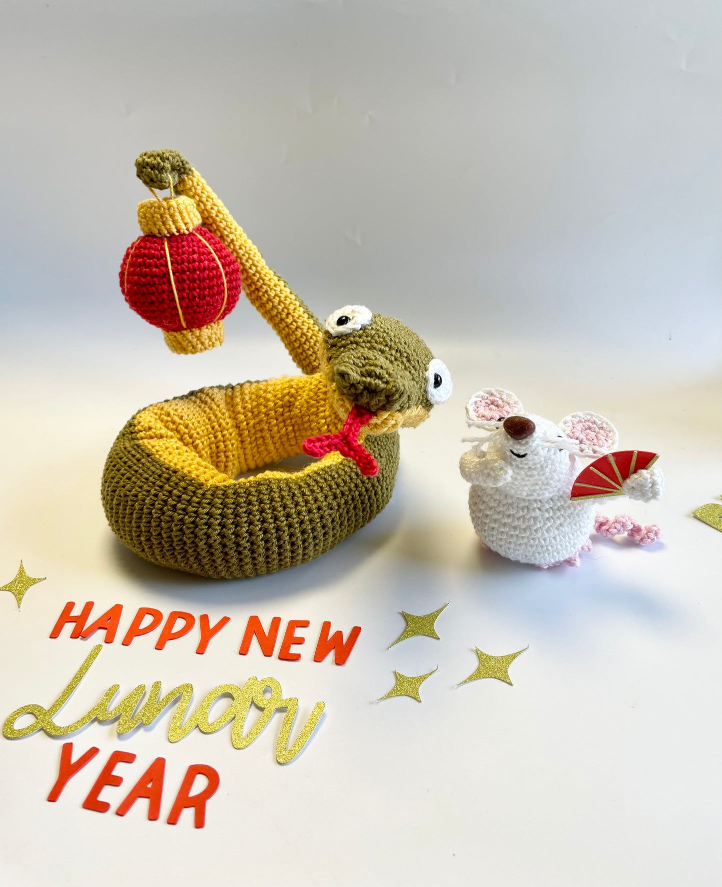 Lunar New Year Snake & Lantern Crochet Kit. Complete kit with full instructions, crochet hook and luxury yarns.