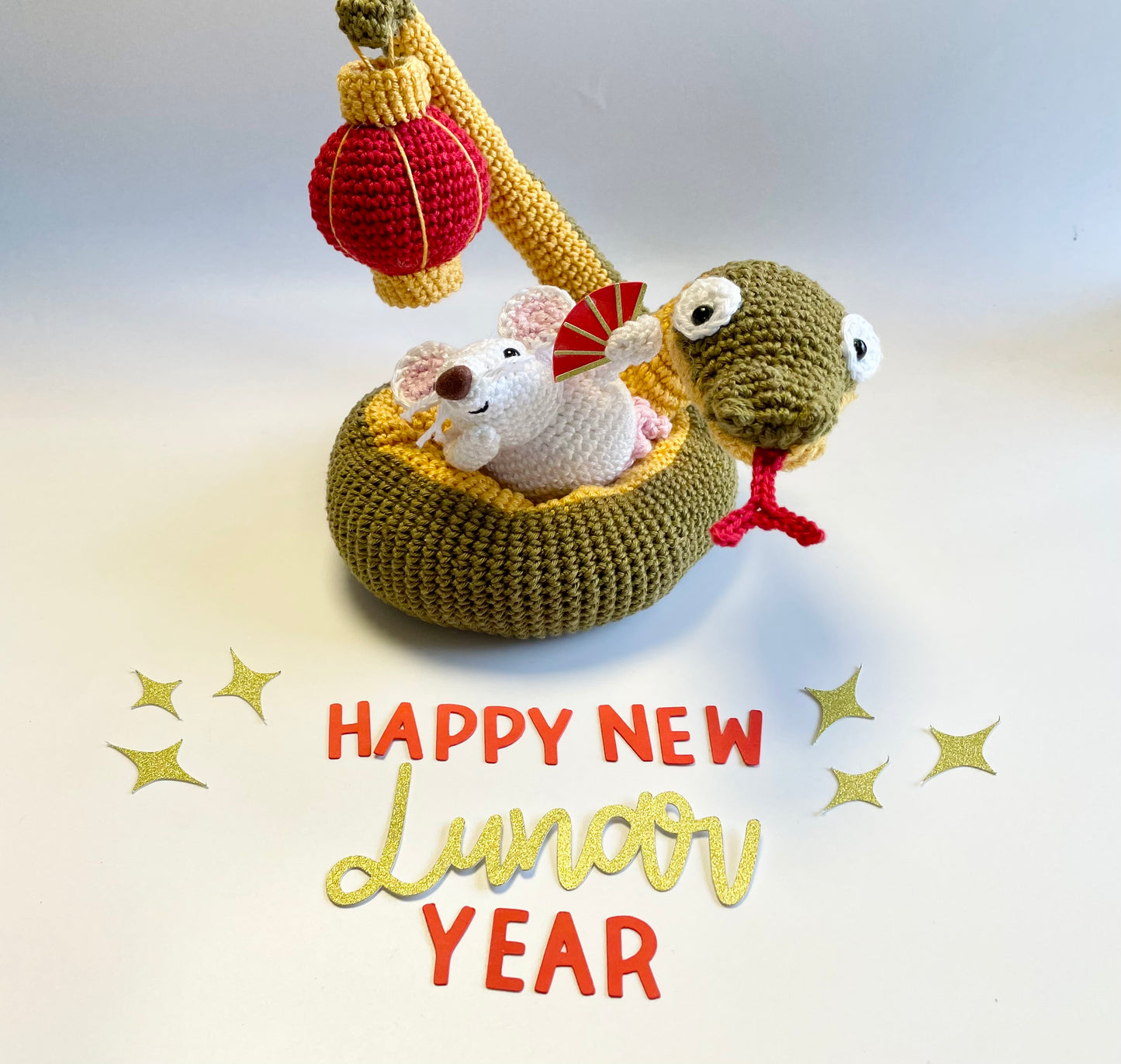 Lunar New Year Snake & Lantern Crochet Kit. Complete kit with full instructions, crochet hook and luxury yarns.