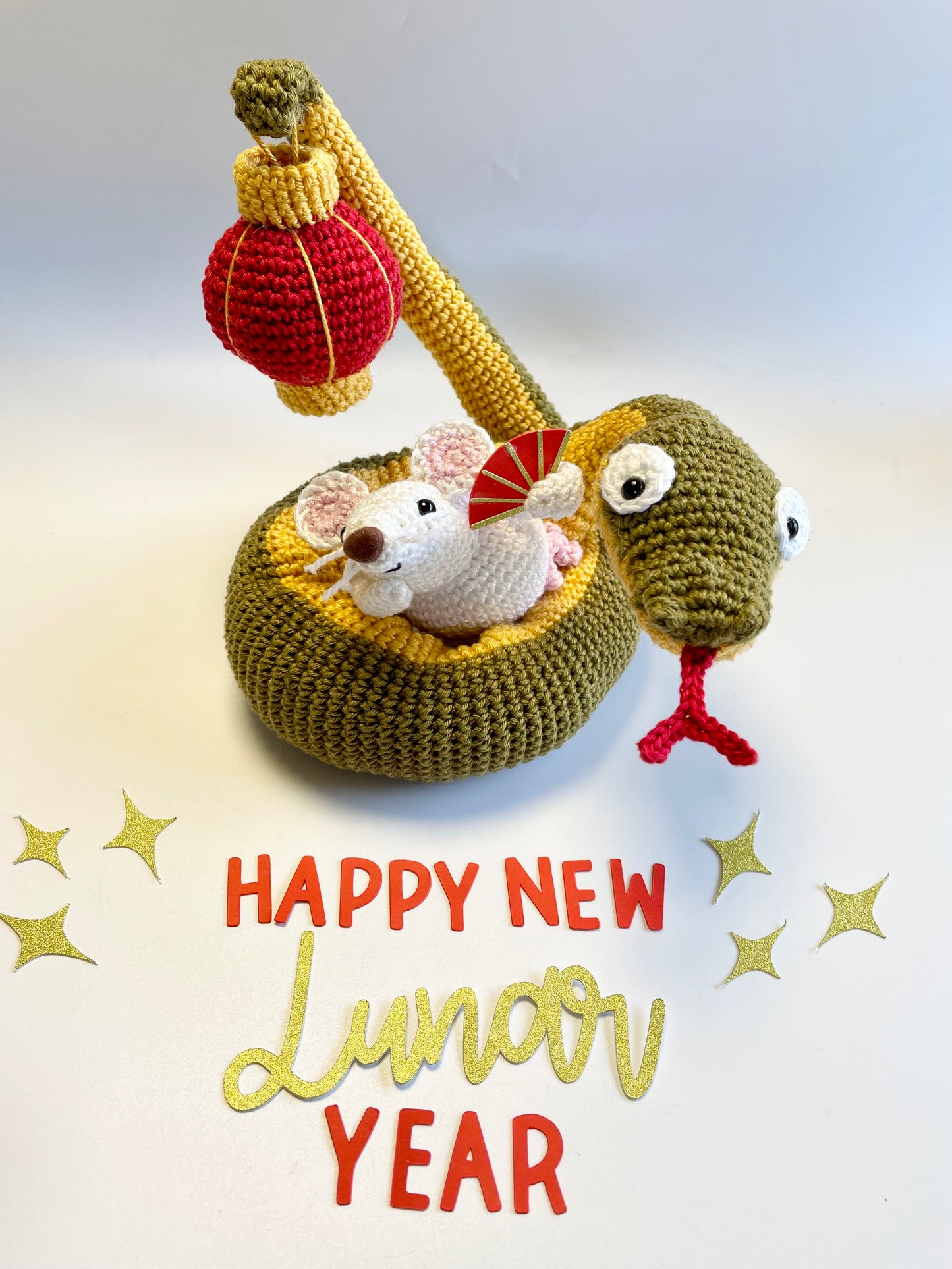 Lunar New Year Snake & Lantern Crochet Kit. Complete kit with full instructions, crochet hook and luxury yarns.