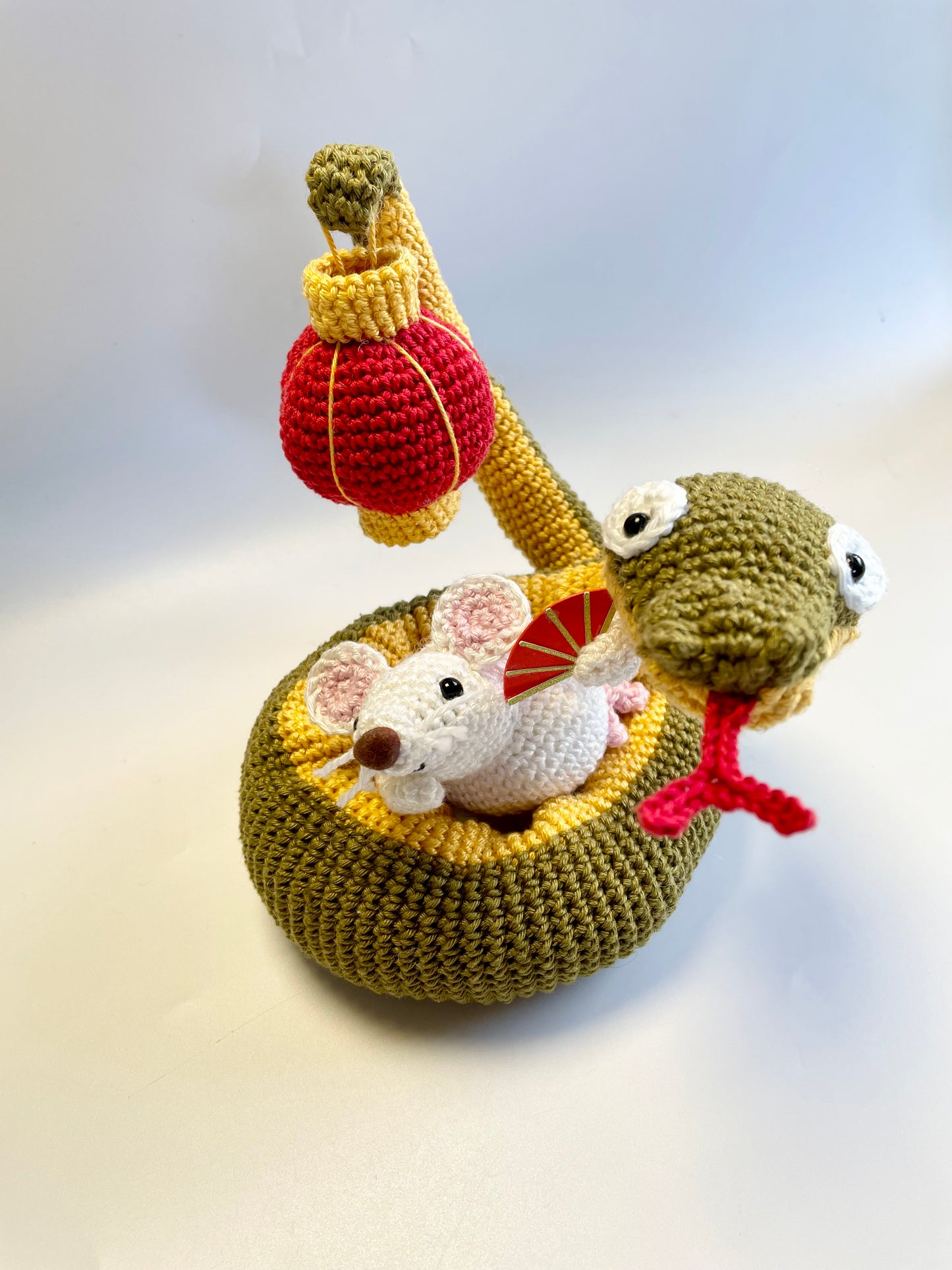 Lunar New Year Snake & Lantern Crochet Kit. Complete kit with full instructions, crochet hook and luxury yarns.