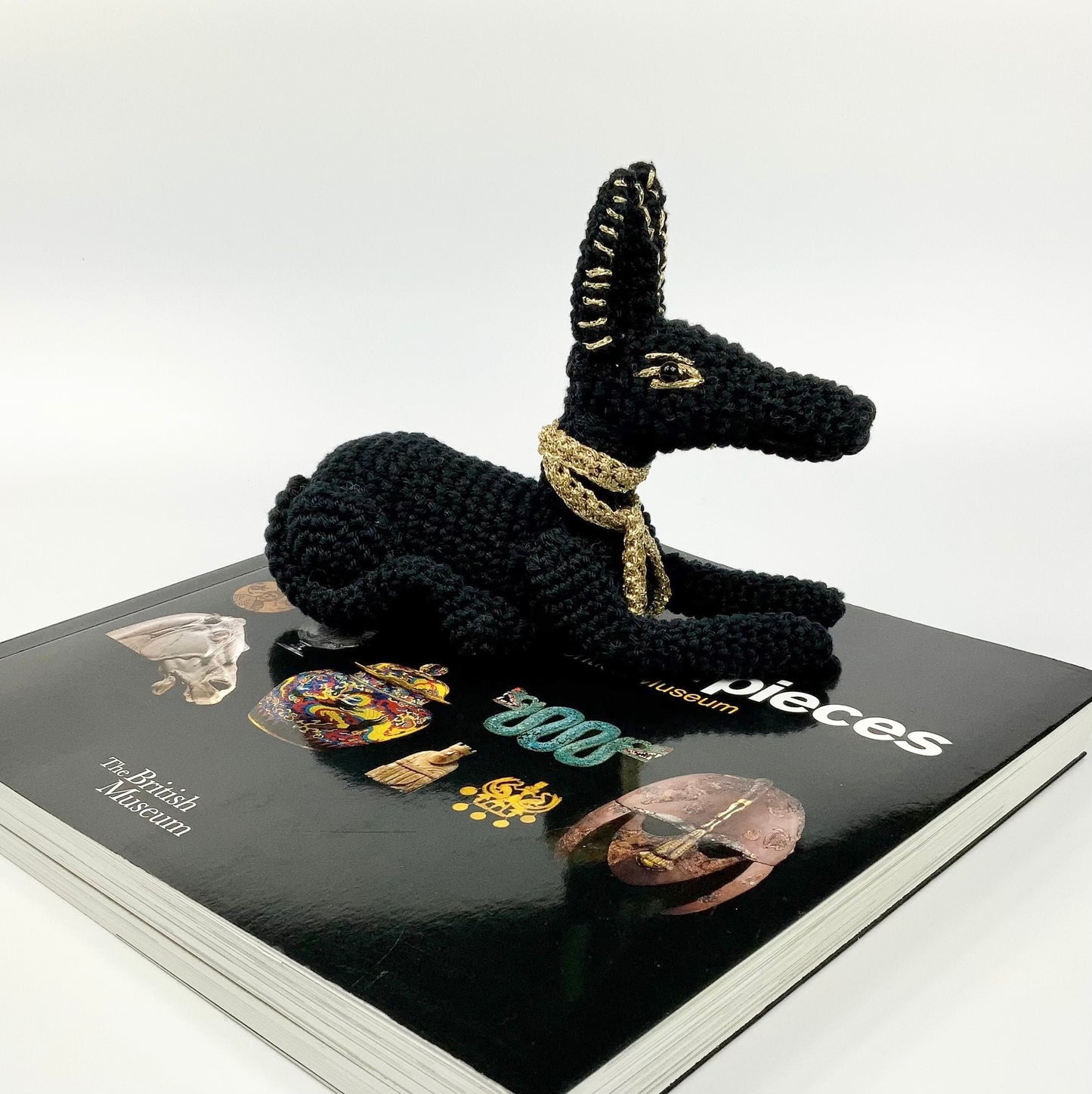 Anubis Crochet Kit. Complete Kit with Luxury British Yarn & a silver-plated Ankh Stitch-Marker. Designed for The British Museum.