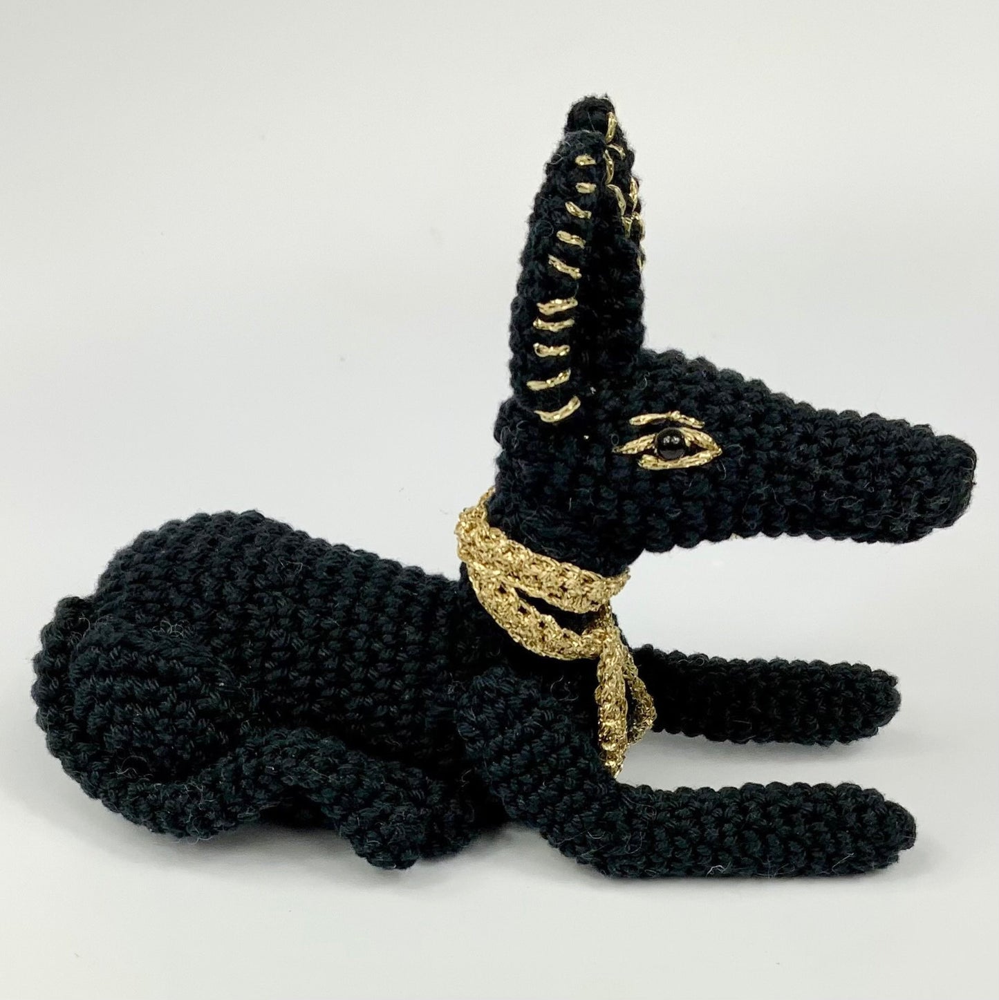 Anubis Crochet Kit. Complete Kit with Luxury British Yarn & a silver-plated Ankh Stitch-Marker. Designed for The British Museum.