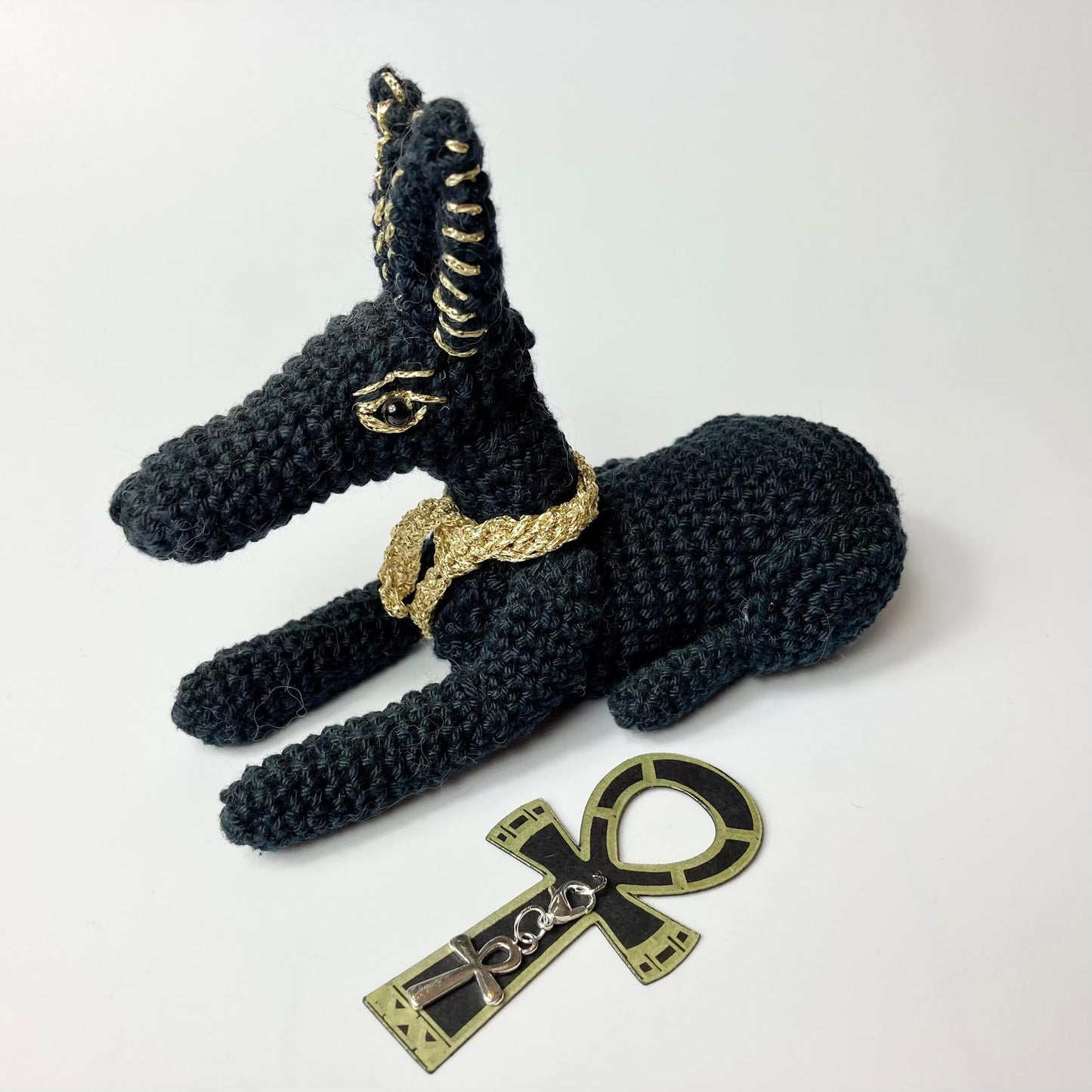 Anubis Crochet Kit. Complete Kit with Luxury British Yarn & a silver-plated Ankh Stitch-Marker. Designed for The British Museum.