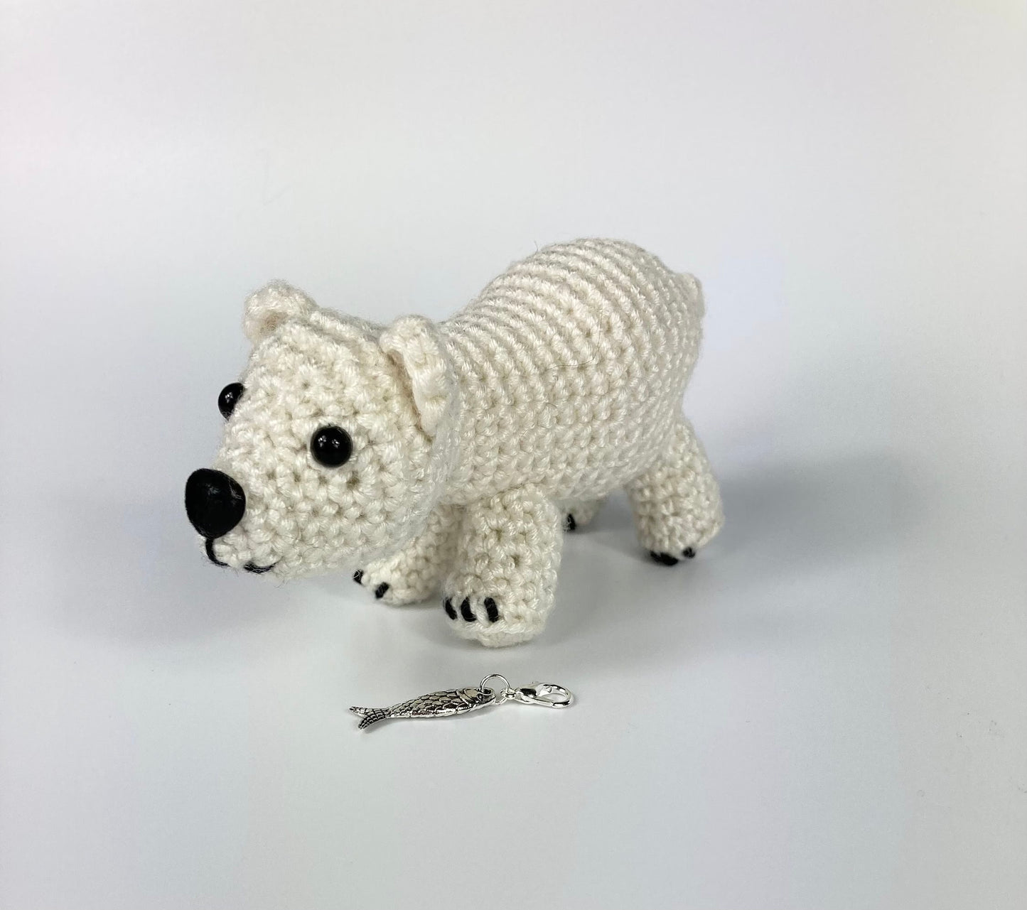 Polar Bear Cub Kit. A full kit with luxury yarns and fittings plus a silver fish stitch marker.