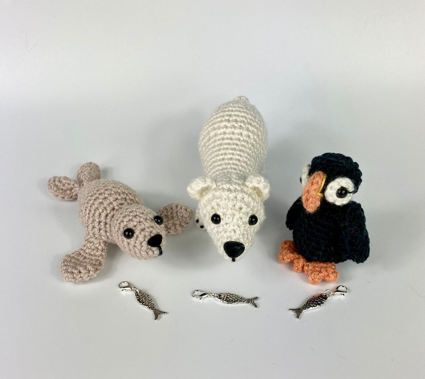 Polar Bear Cub Kit. A full kit with luxury yarns and fittings plus a silver fish stitch marker.
