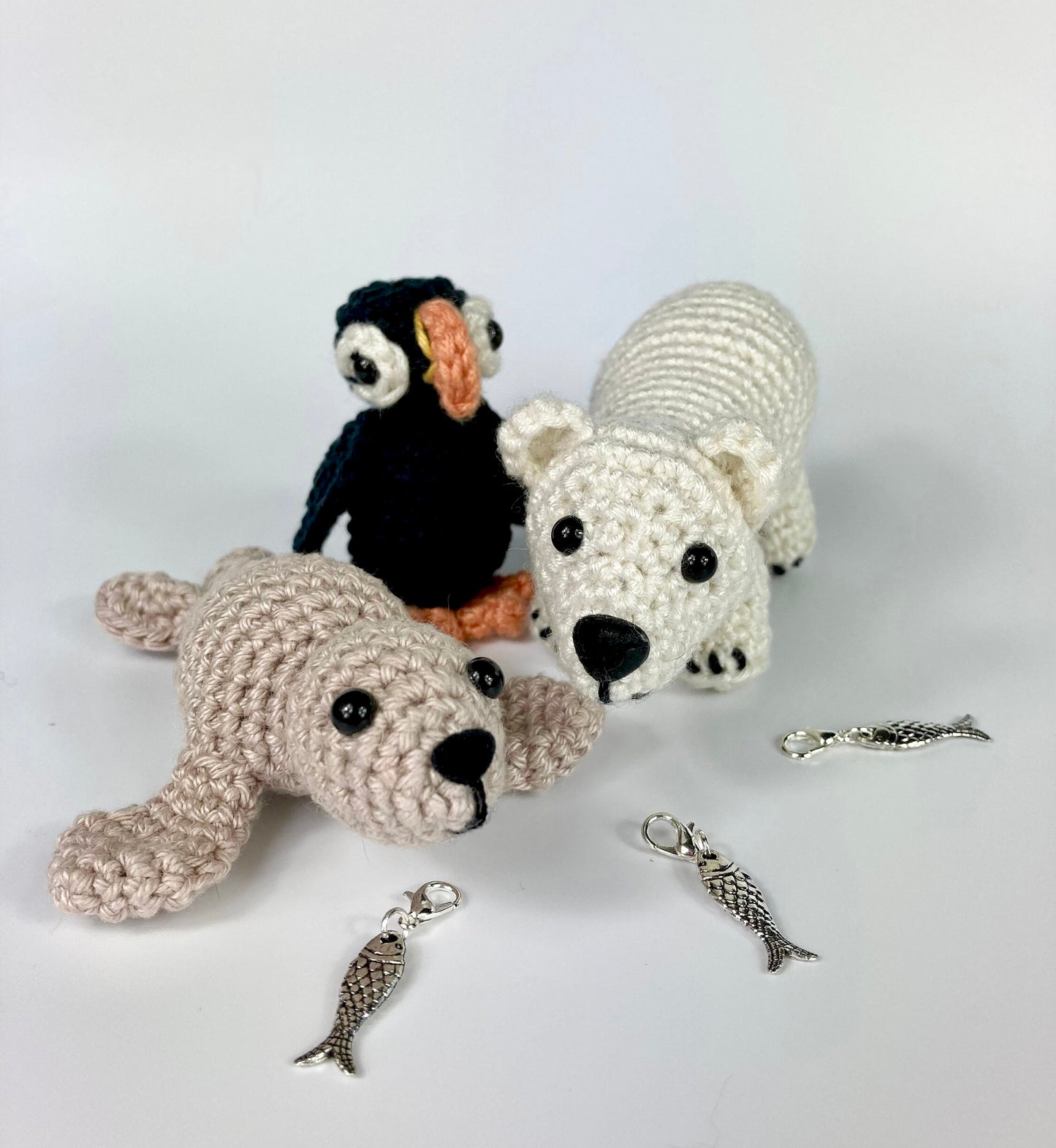 Polar Bear Cub Kit. A full kit with luxury yarns and fittings plus a silver fish stitch marker.