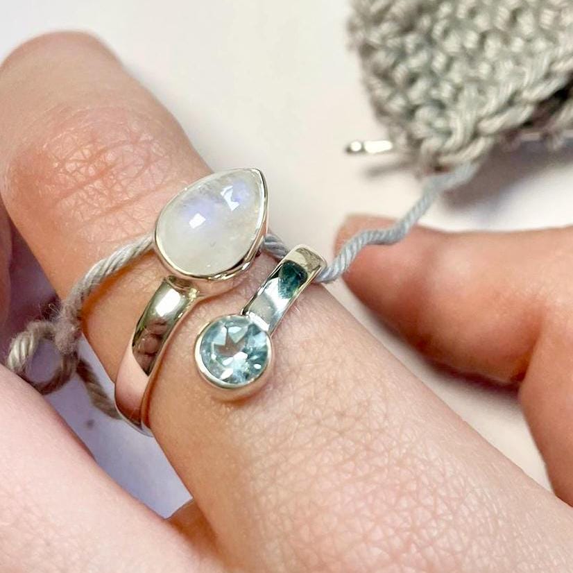 Handmade Blue Topaz and Moonstone Sterling Silver Crochet Ring. Adjustable for crochet tension and comfort. Handmade for Nautilus Crochet.