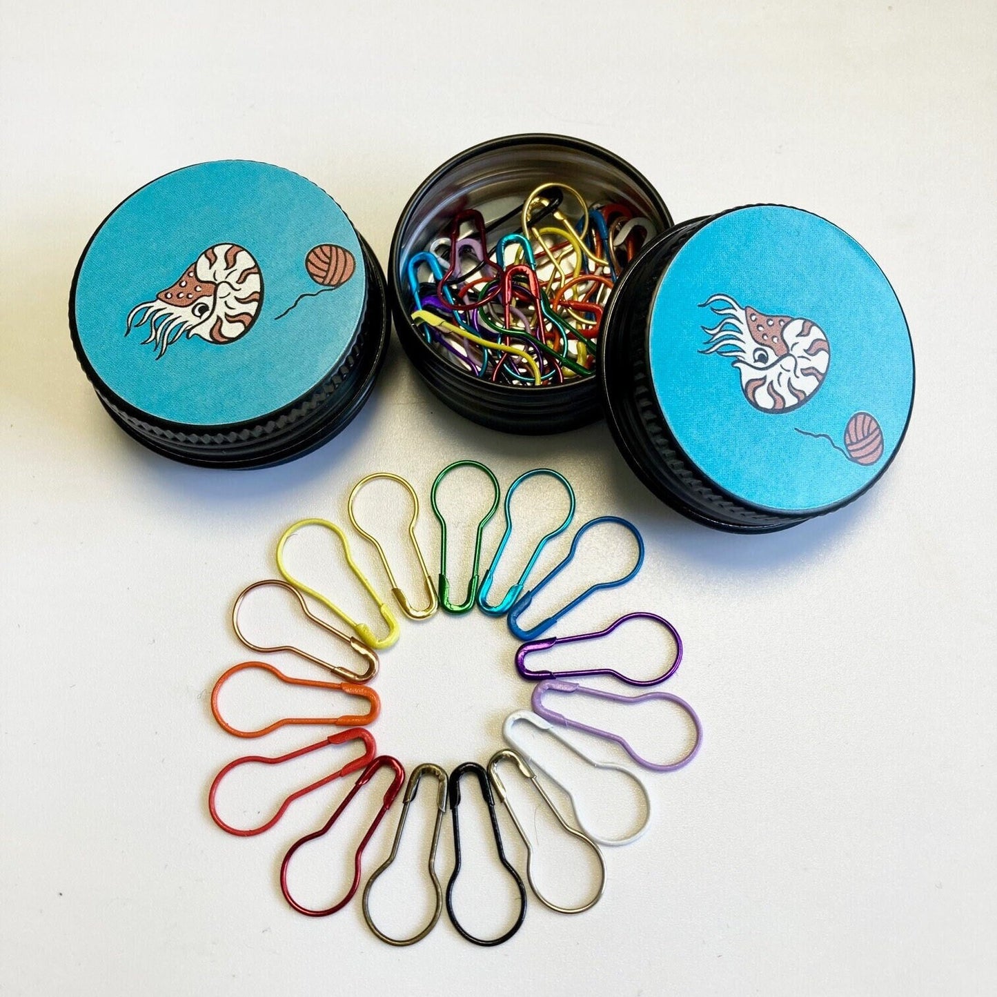 Nautilus Crochet Stitch Markers. 30 Metal Bulb Shaped Pins, in 15 Different Colours. Mark & Secure your Crochet. All in a Cute Metal Tin.