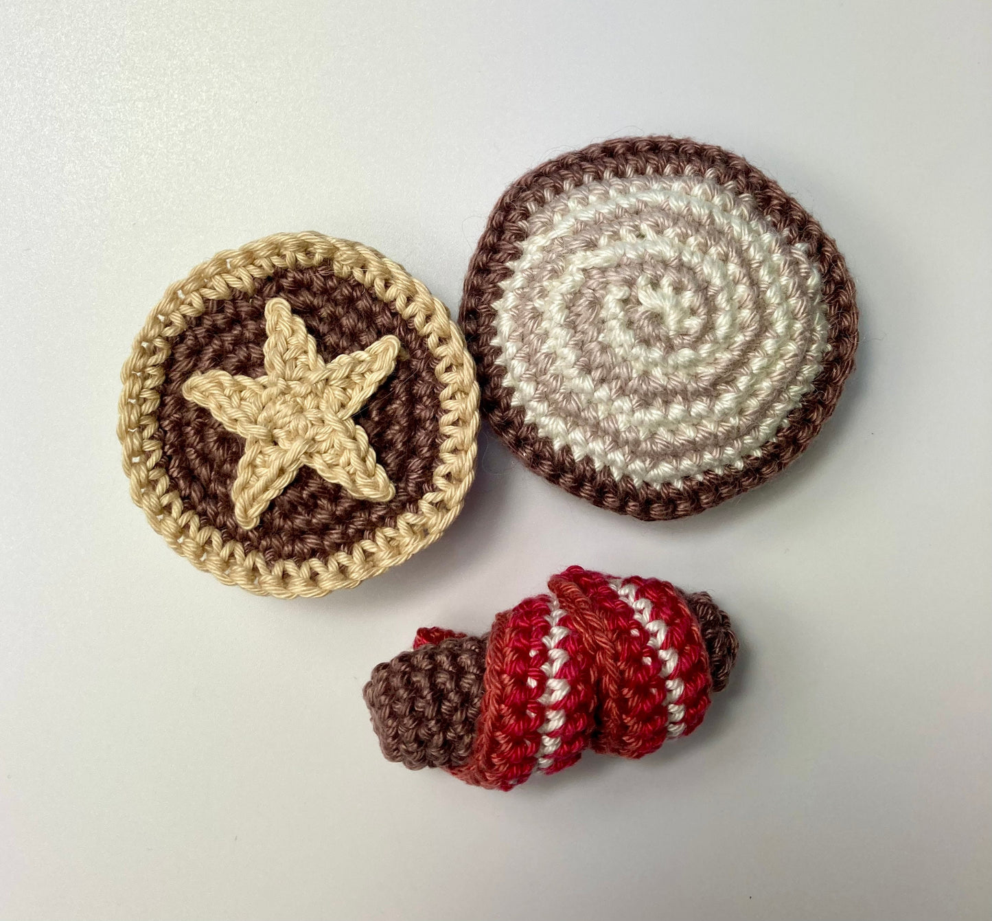 Christmas Secret Santa Mini Crochet Kits. Everything you need to make these 3 fun festive designs. Mince Pie, Pig in Blanket or Yule log