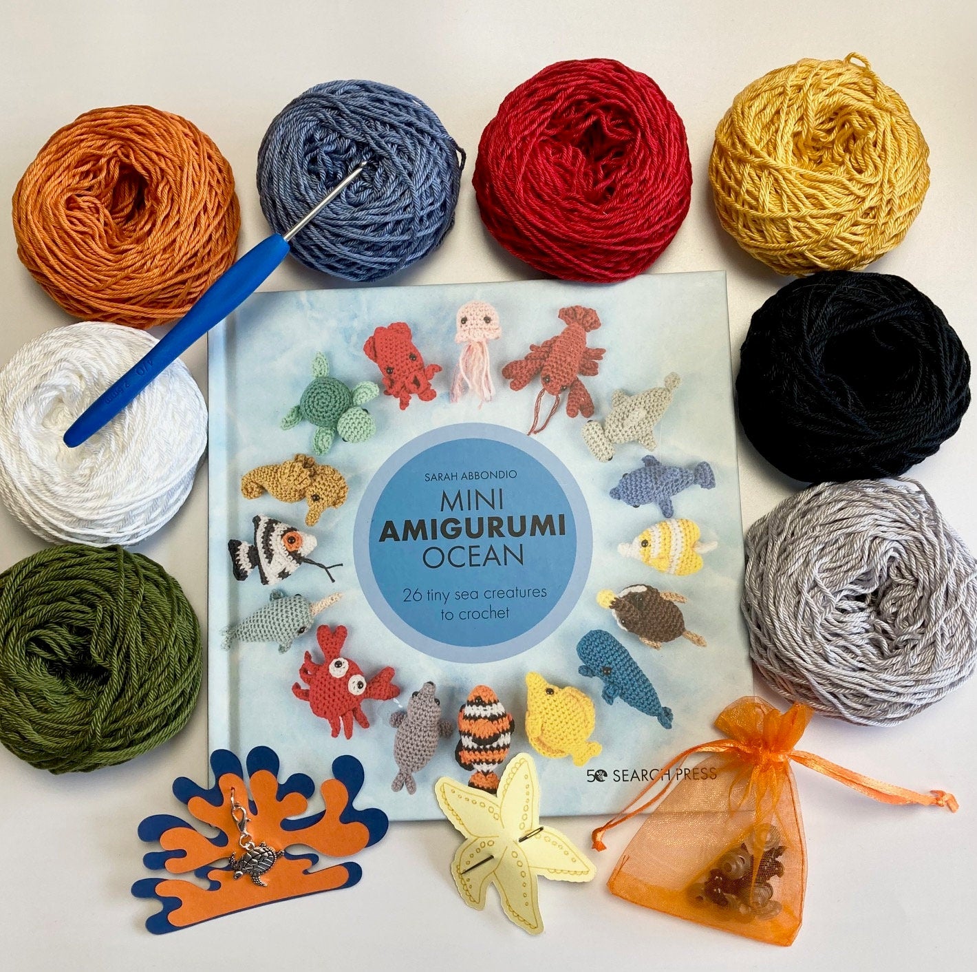 Crocheted Ocean Kit. Book, luxury yarn, crochet hook, turtle stitch marker & accessories. Make the cutest sea creature buddies!