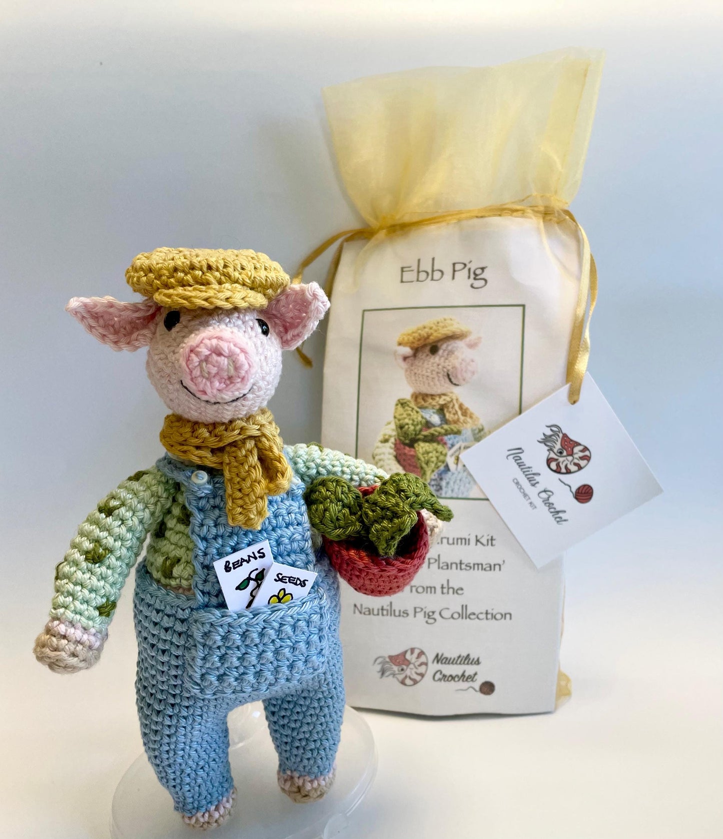 Ebb The Gardener! Pig Amigurumi Crochet Kit featuring Ebb, A laid-back, dungaree clad pig with a passion for Plants!