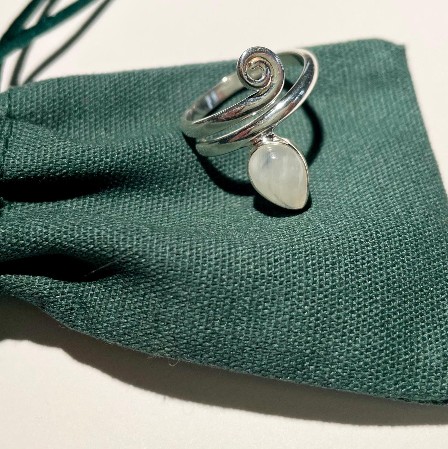Handmade Teardrop Moonstone Sterling Silver Crochet Ring. Adjustable for crochet tension and comfort. Handmade for Nautilus Crochet.
