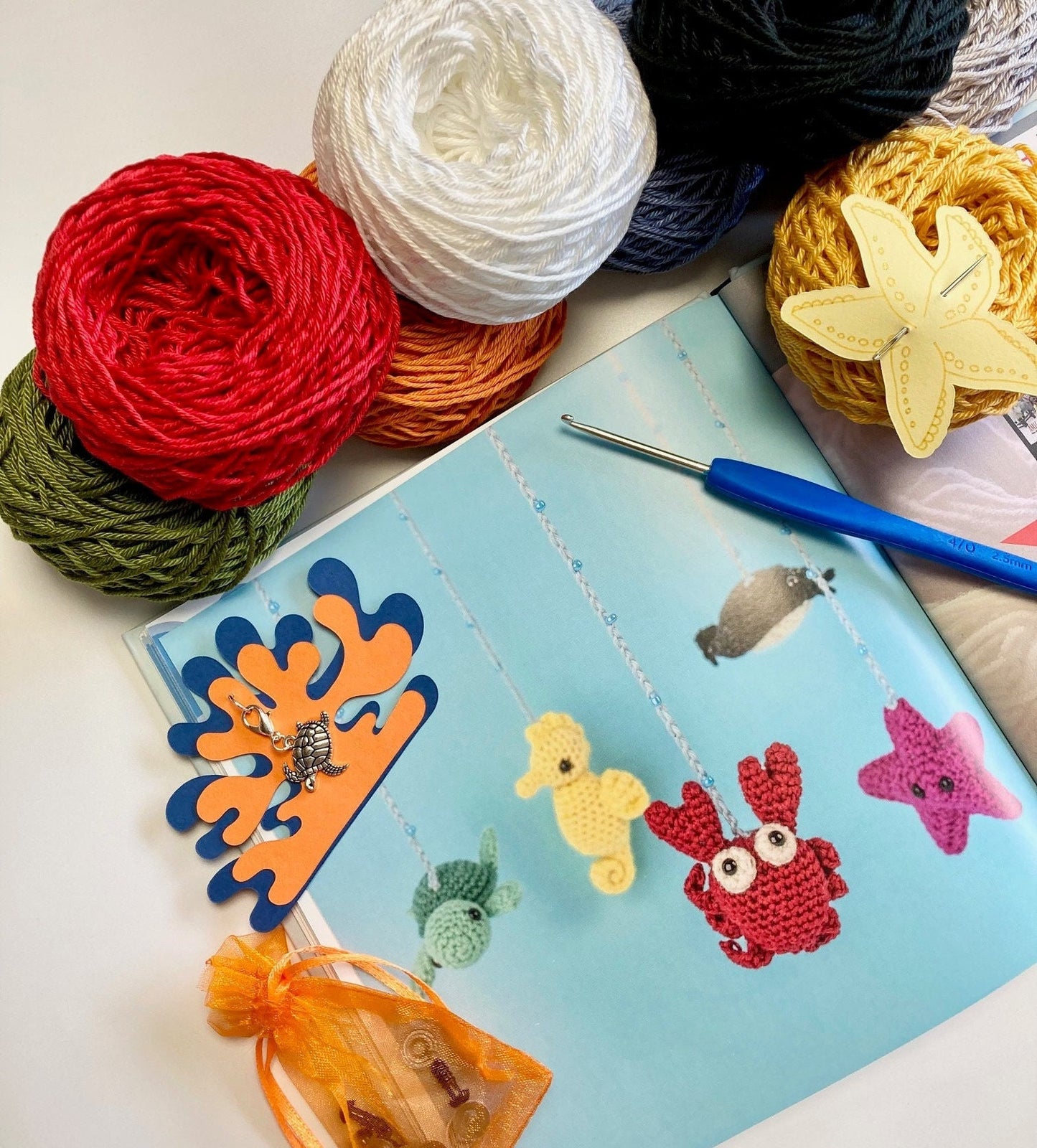Crocheted Ocean Kit. Book, luxury yarn, crochet hook, turtle stitch marker & accessories. Make the cutest sea creature buddies!
