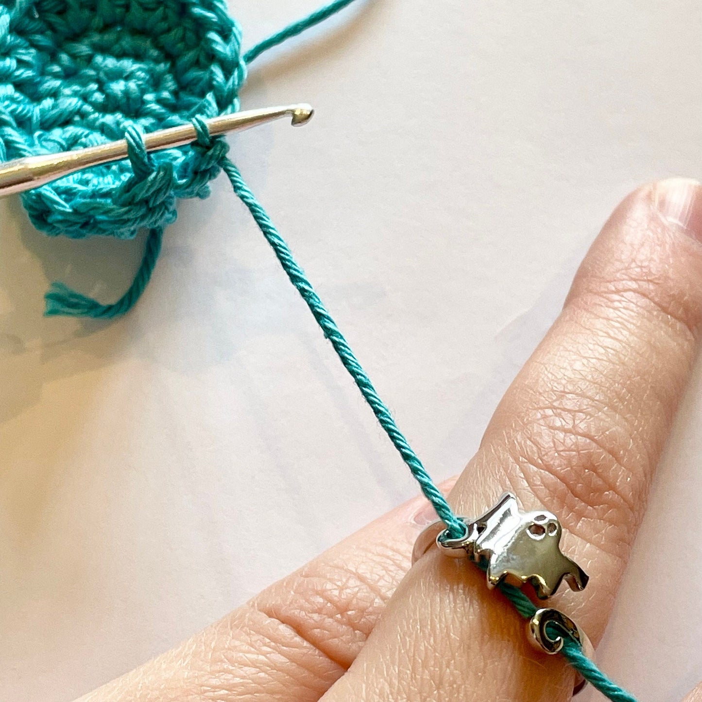 Tiny floating Ghost Silver Plated Crochet Ring. Adjustable size for crochet tension and comfort.