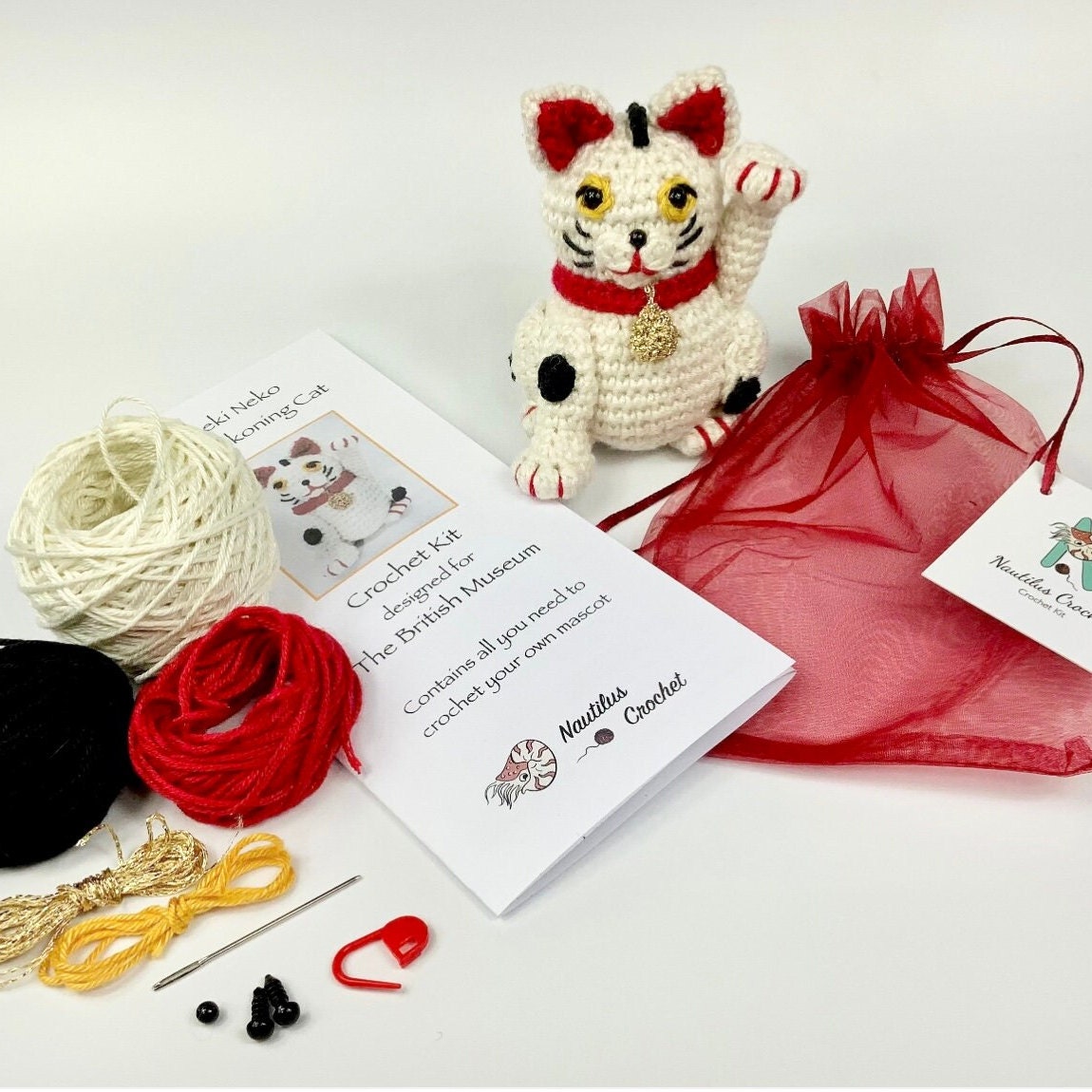 Maneki Neko the Japanese Beckoning Cat Amigurumi Crochet Kit. A complete kit with luxury, natural yarns.