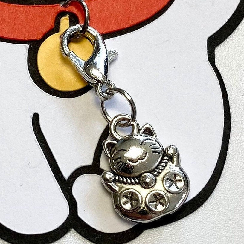 Maneki Neko the Japanese Beckoning Cat Amigurumi Crochet Kit. A complete kit with luxury, natural yarns.
