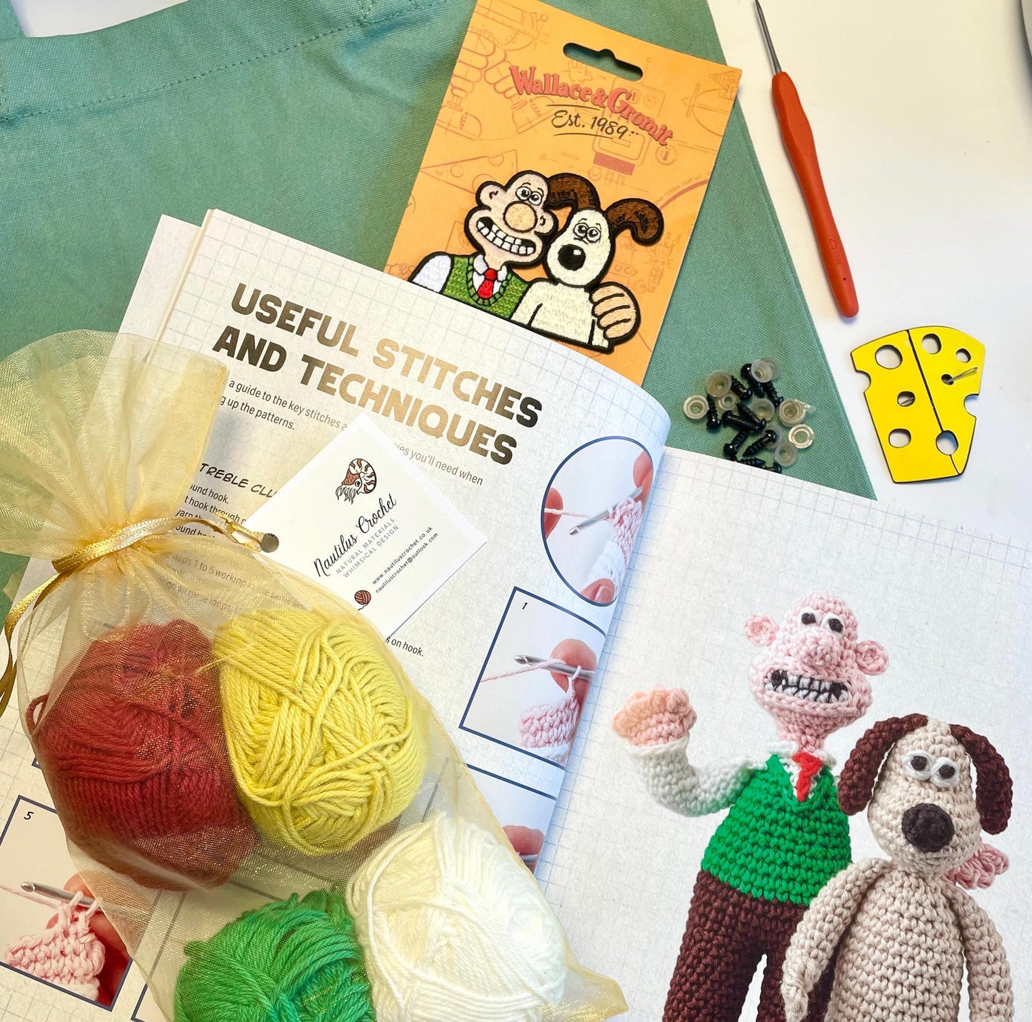 Wallace & Gromit Cracking Crochet Kit. Book, Luxury Cotton Yarns, Hook and accessories in an Organic Cotton 'Cracking Crochet Gromit' Bag.
