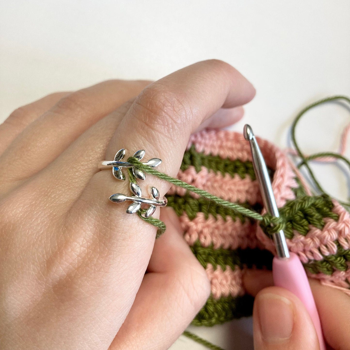 Olive Leaves Crochet Ring. Olive leaves feature in this silver plated, adjustable ring for crochet tension and comfort.