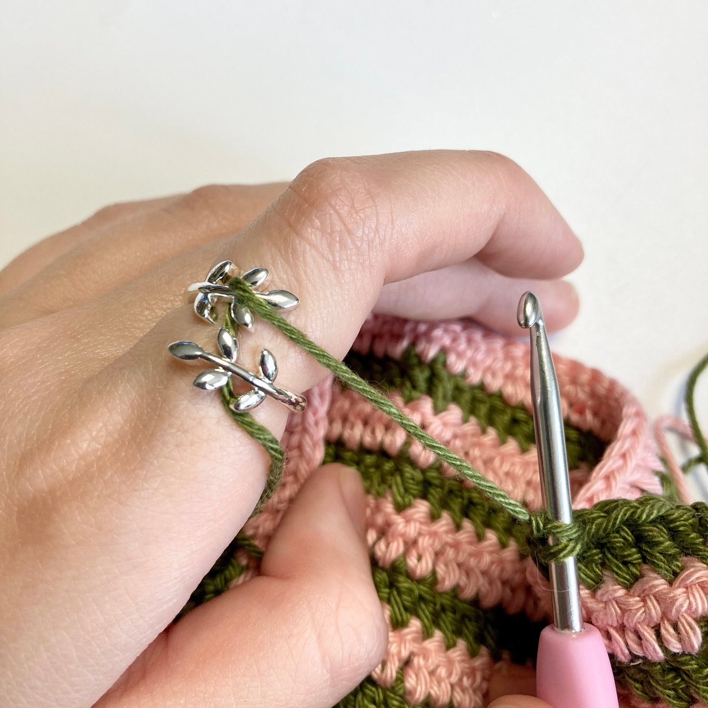 Olive Leaves Crochet Ring. Olive leaves feature in this silver plated, adjustable ring for crochet tension and comfort.
