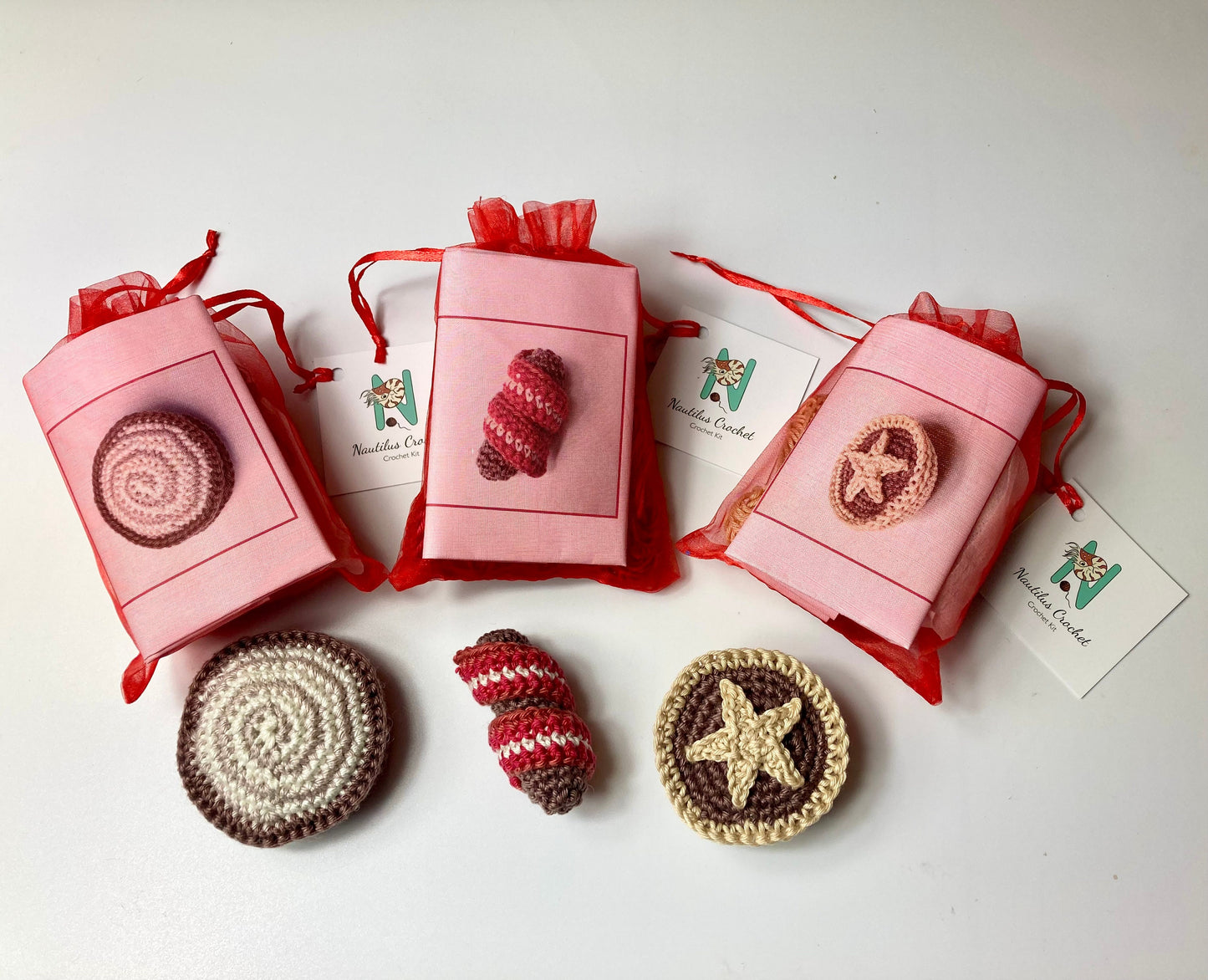 Christmas Secret Santa Mini Crochet Kits. Everything you need to make these 3 fun festive designs. Mince Pie, Pig in Blanket or Yule log